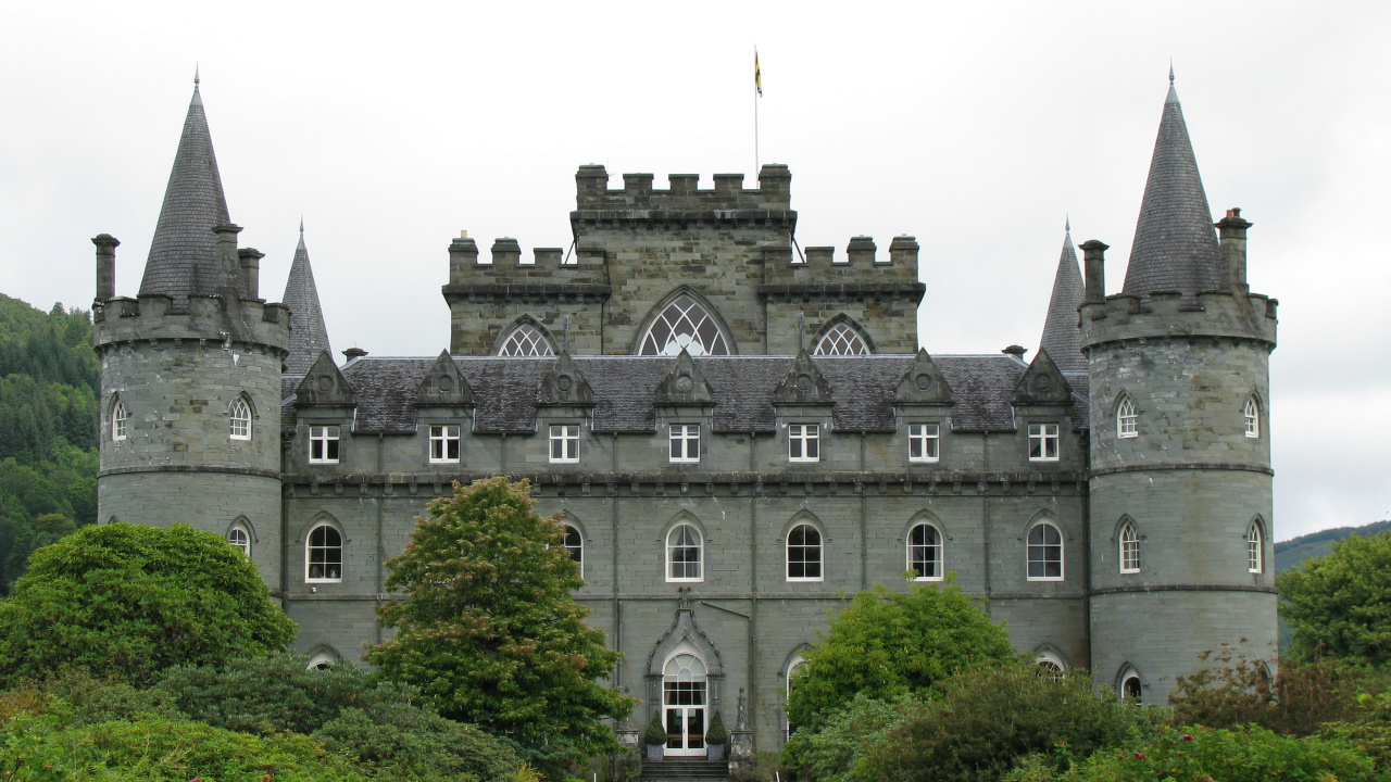 Gray Concrete Building Near Green Trees During Daytime. Wallpaper in 1280x720 Resolution