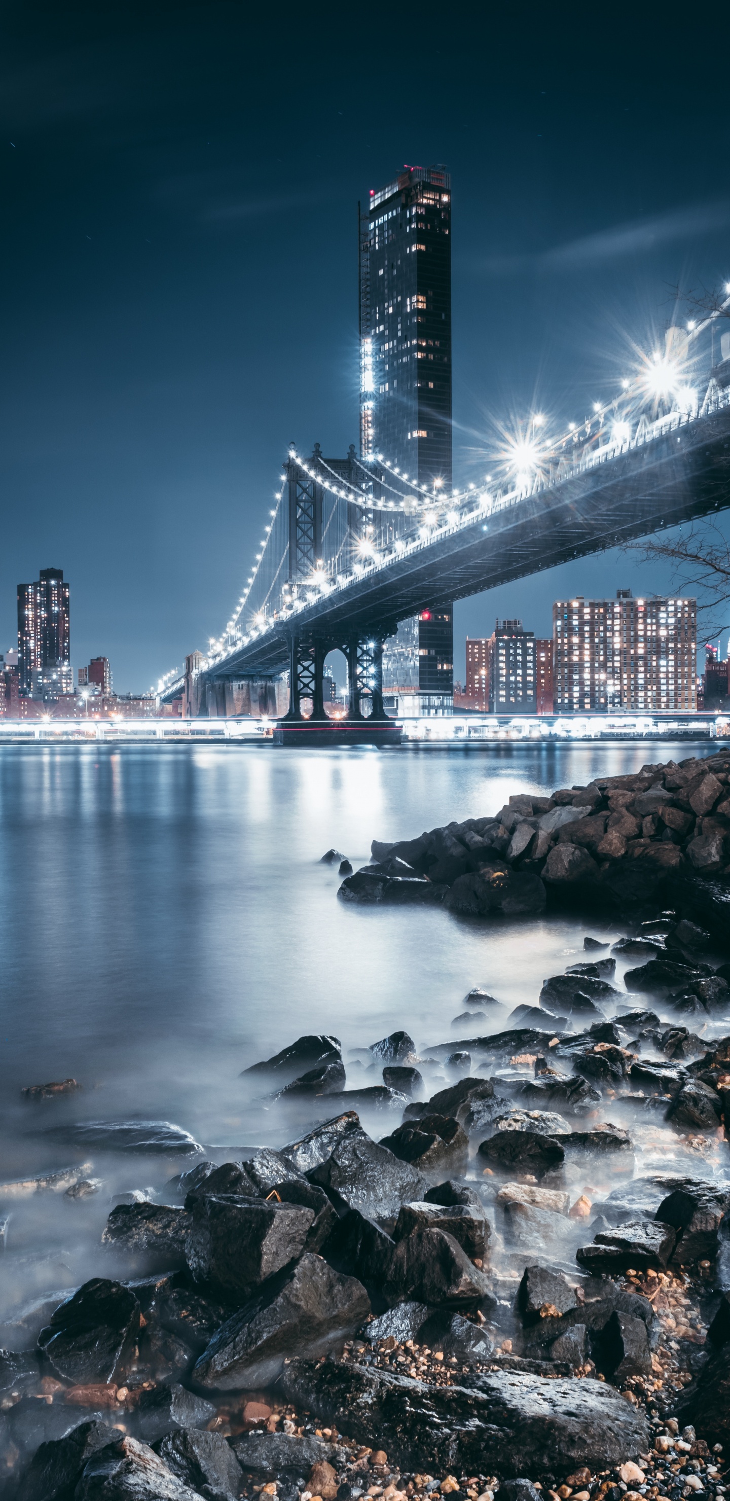 Bridge Over Water During Night Time. Wallpaper in 1440x2960 Resolution