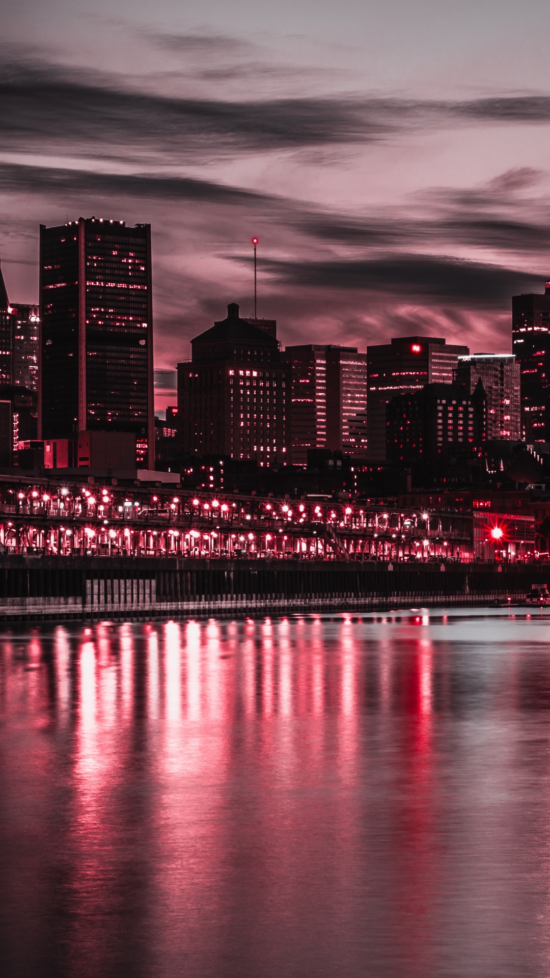 City Skyline Across Body of Water During Night Time. Wallpaper in 1080x1920 Resolution