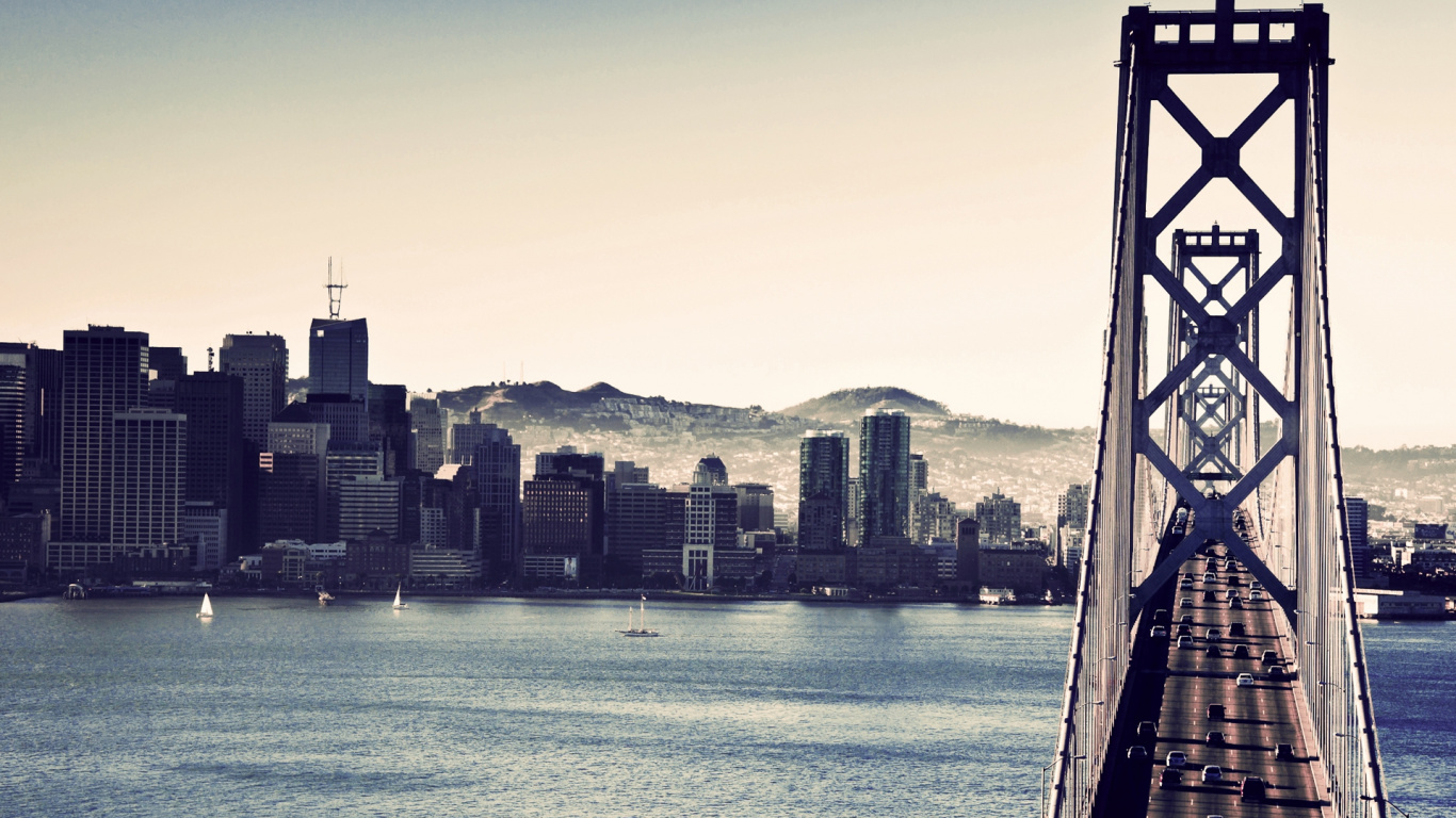 City Skyline Across Body of Water During Daytime. Wallpaper in 1366x768 Resolution