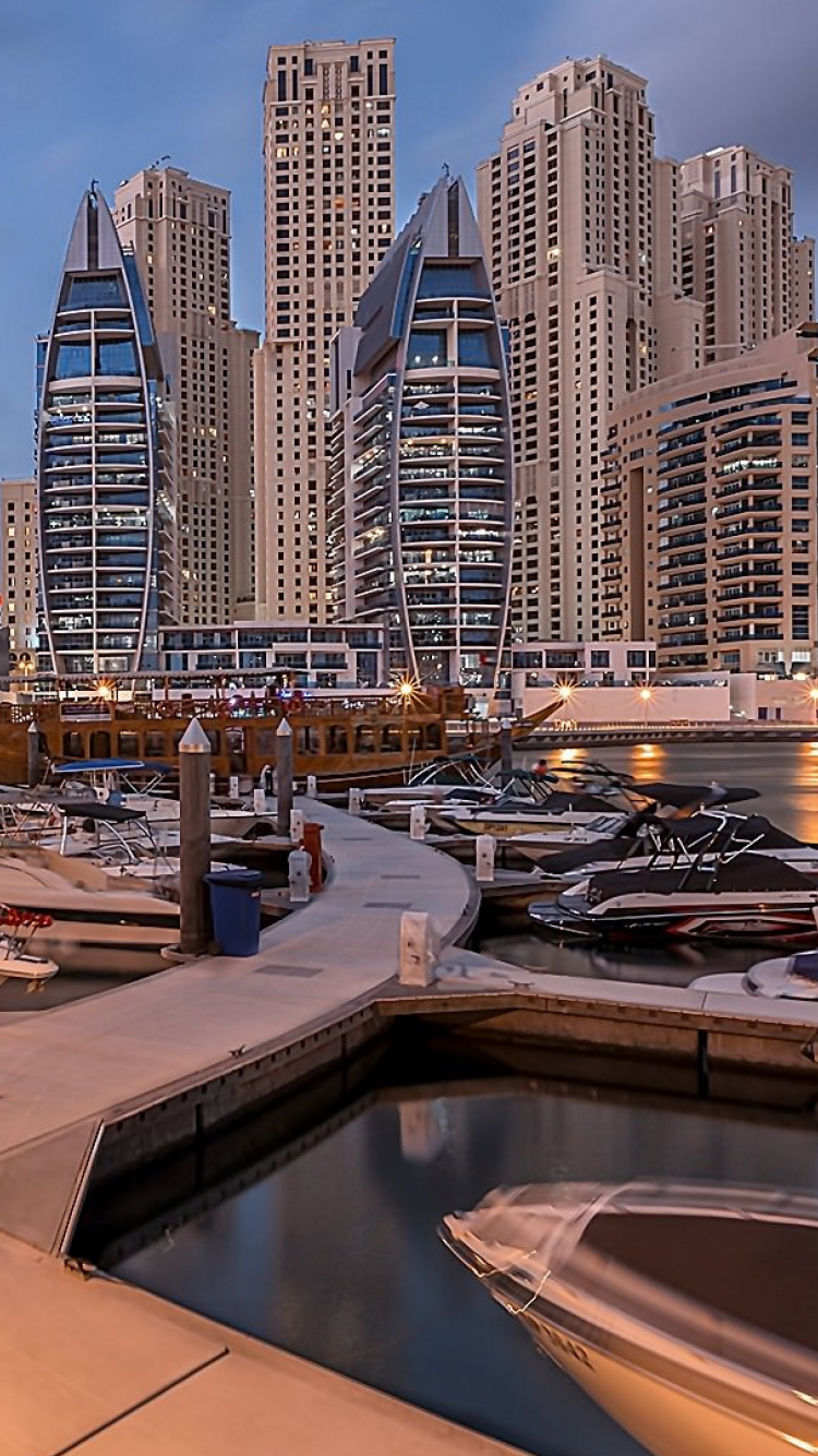 White and Brown Boat on Dock Near City Buildings During Daytime. Wallpaper in 750x1334 Resolution
