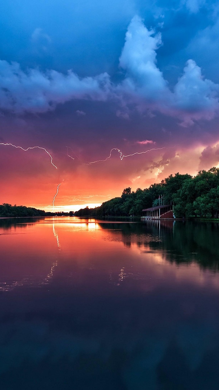 Green Trees Beside Body of Water Under Blue Sky and White Clouds During Daytime. Wallpaper in 720x1280 Resolution