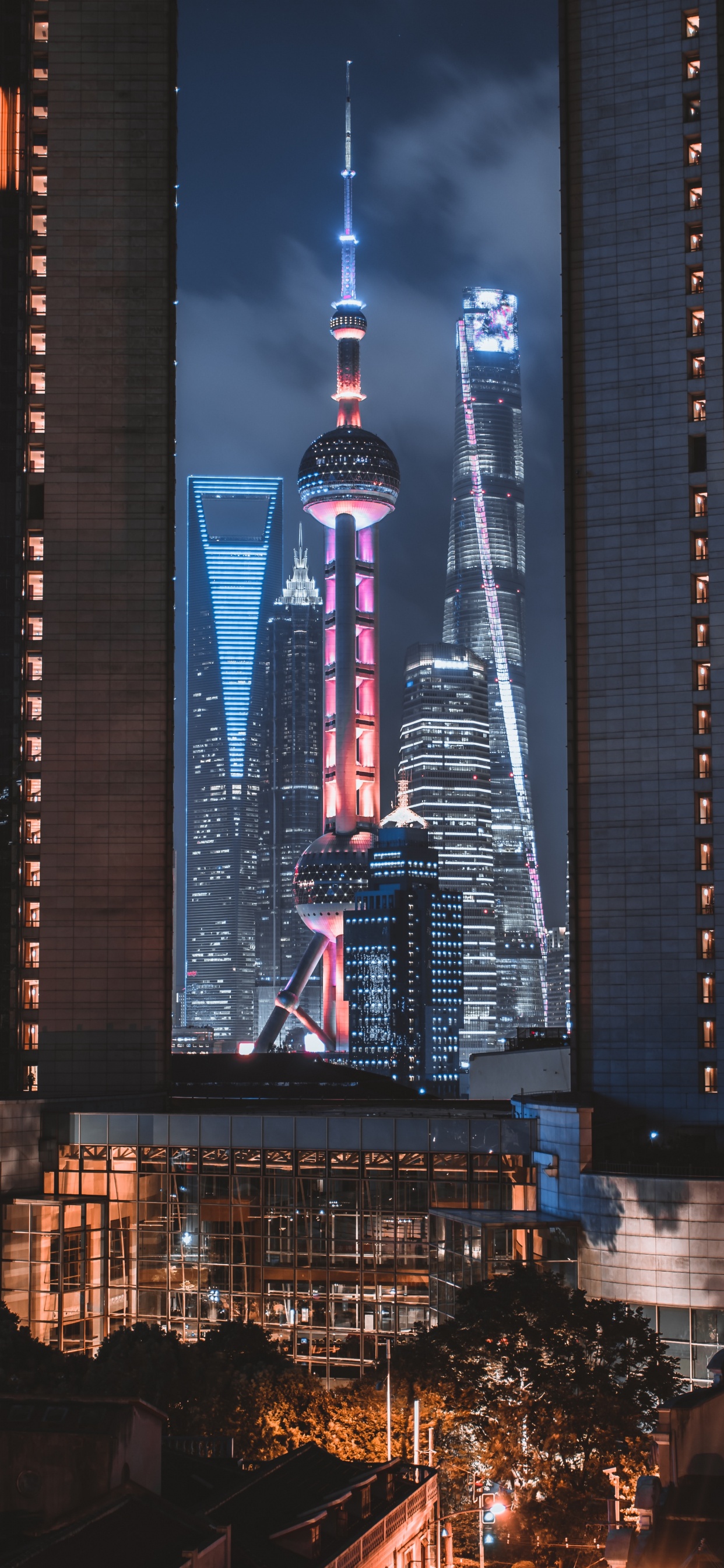 City Skyline During Night Time. Wallpaper in 1242x2688 Resolution