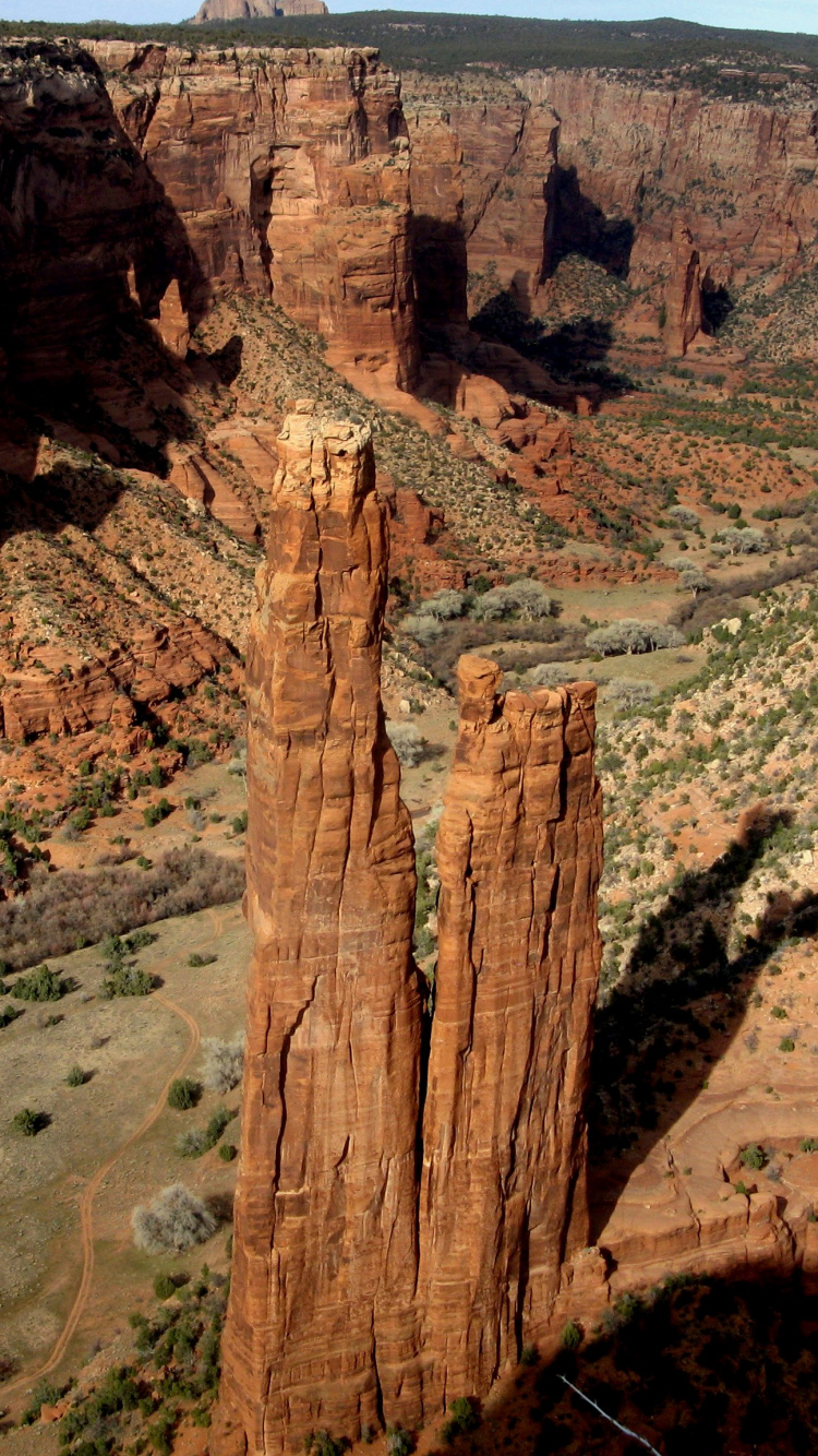 Brown Rock Formation Under Blue Sky During Daytime. Wallpaper in 750x1334 Resolution