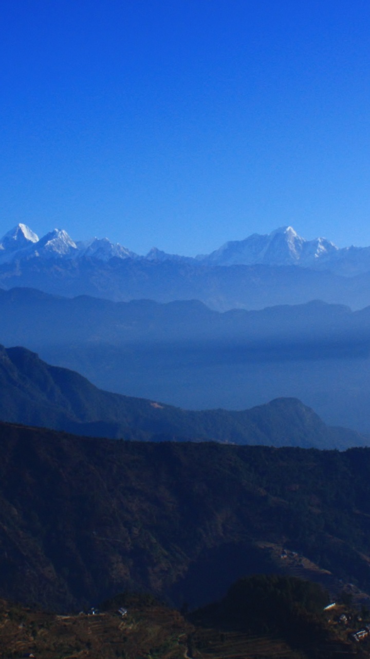 Mountains Under Blue Sky During Daytime. Wallpaper in 720x1280 Resolution