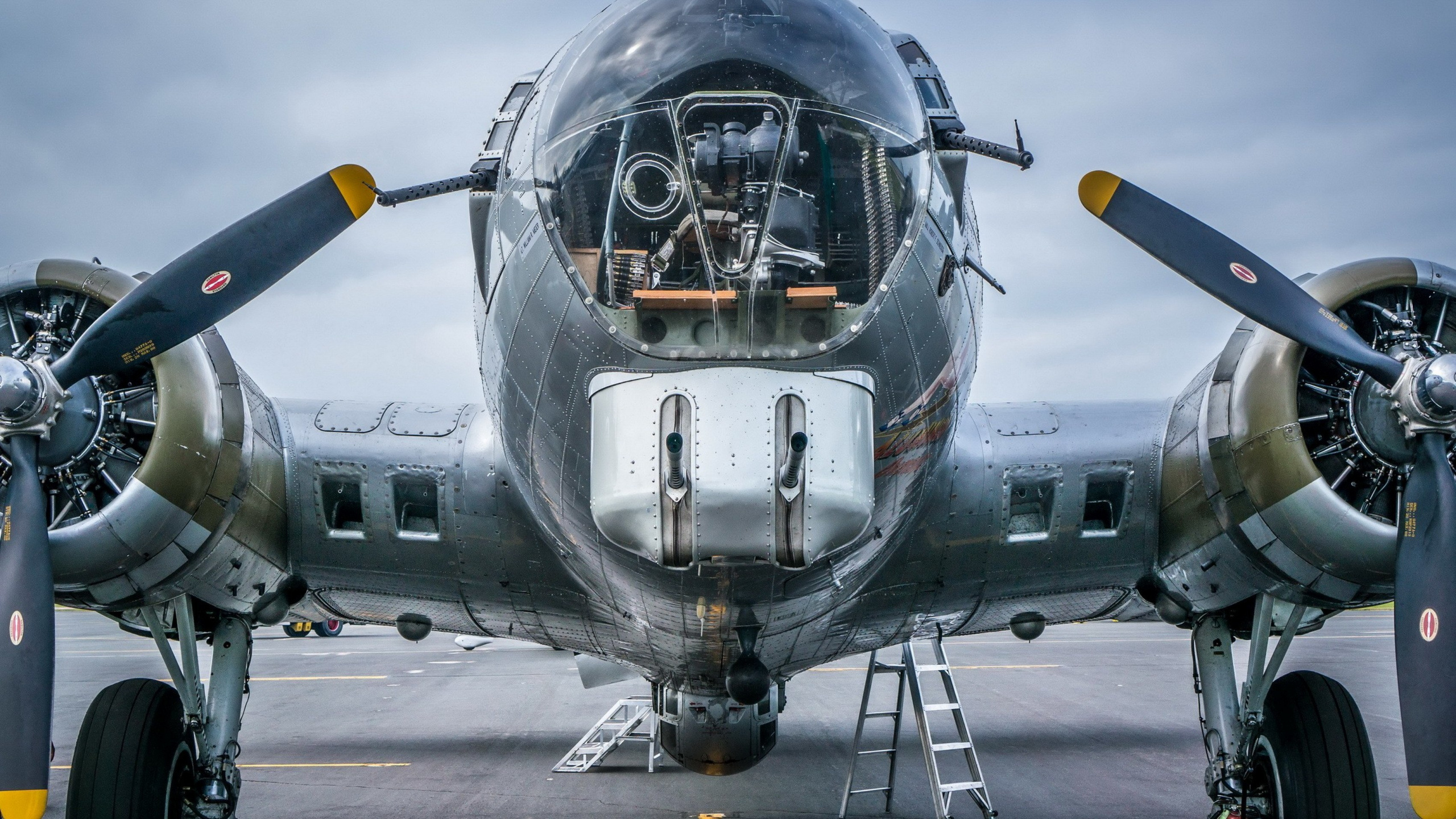 Gray and Yellow Fighter Plane. Wallpaper in 2560x1440 Resolution