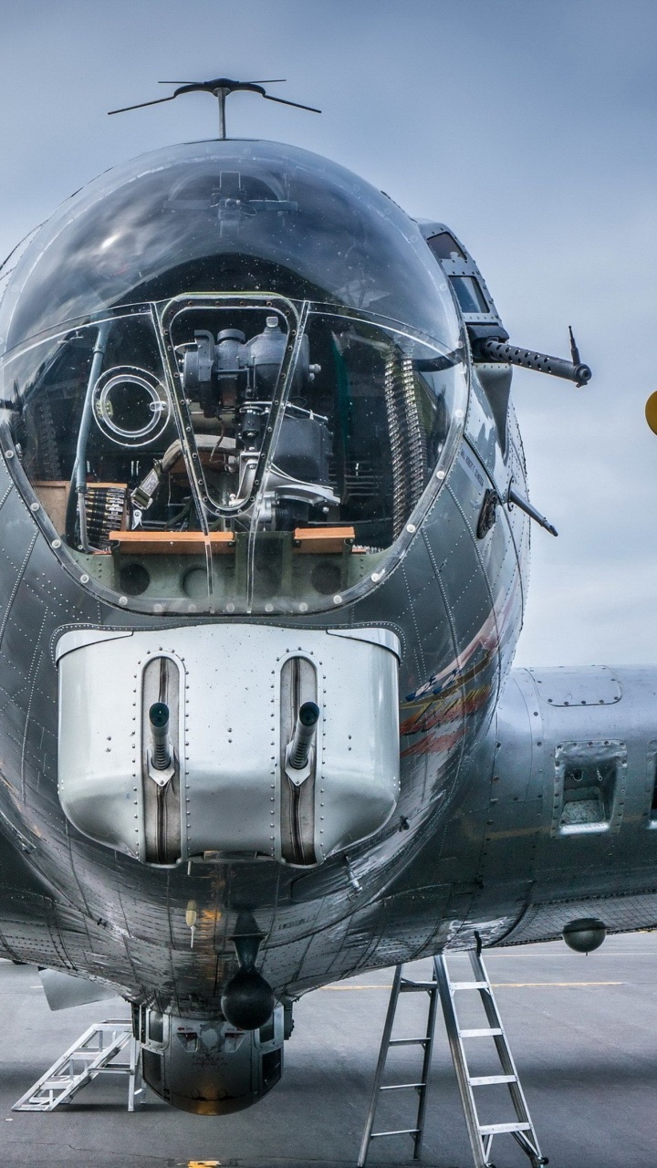 Avion de Chasse Gris et Jaune. Wallpaper in 720x1280 Resolution