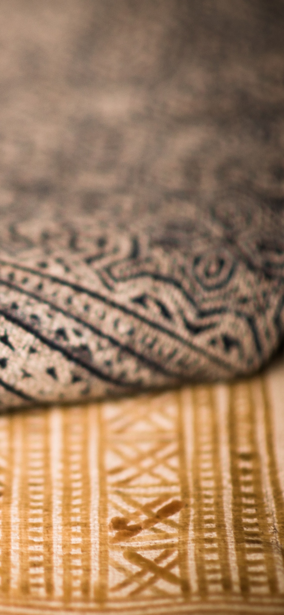 White and Black Tribal Textile. Wallpaper in 1125x2436 Resolution