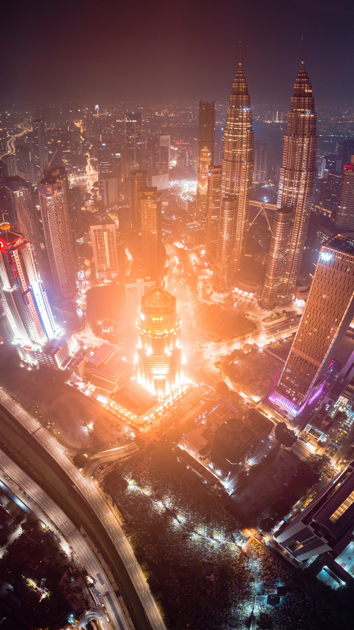 Aerial View of City Buildings During Night Time. Wallpaper in 1440x2560 Resolution