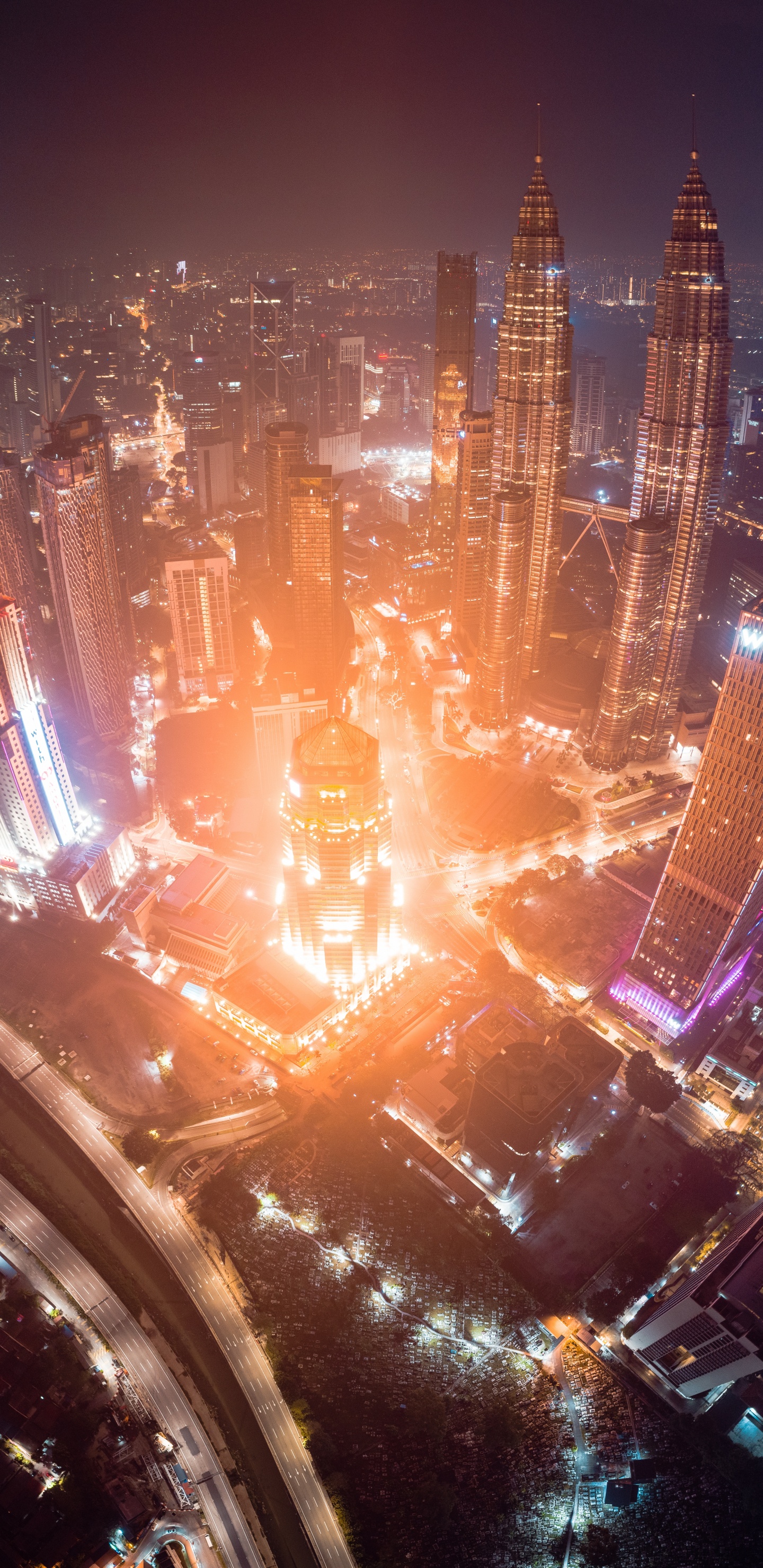 Aerial View of City Buildings During Night Time. Wallpaper in 1440x2960 Resolution