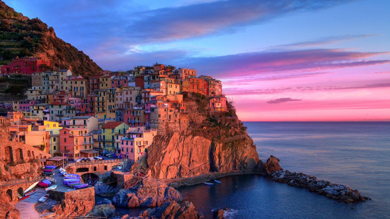 Houses on Cliff Beside Sea During Daytime. Wallpaper in 1366x768 Resolution