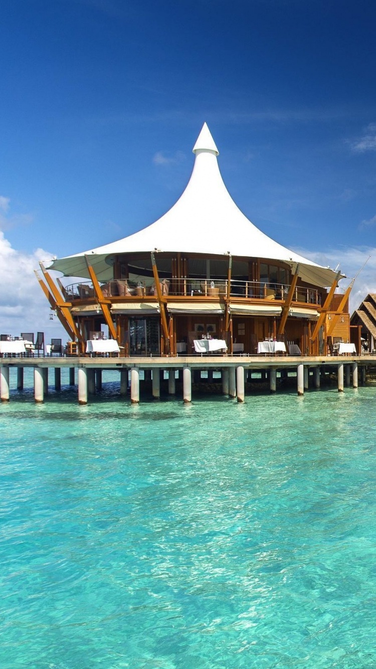 Brown Wooden House on Swimming Pool During Daytime. Wallpaper in 750x1334 Resolution