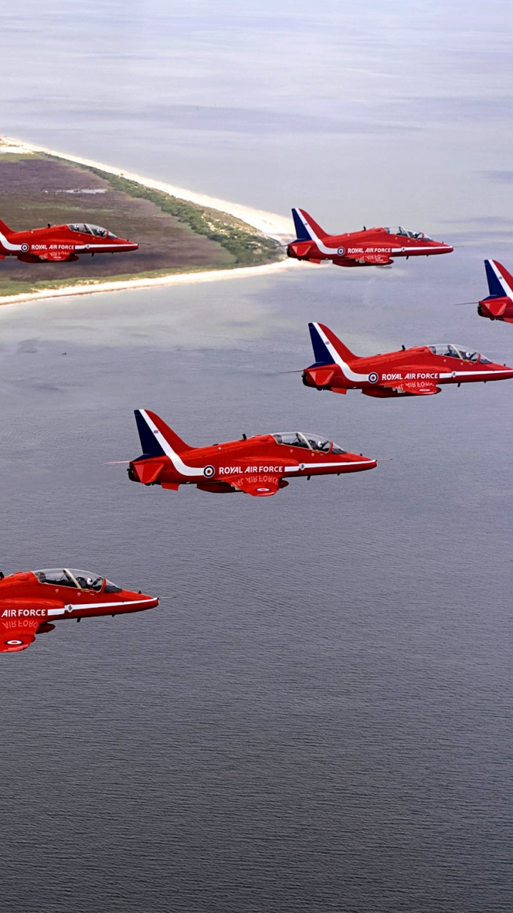 Red and White Jet Plane on The Sky. Wallpaper in 720x1280 Resolution