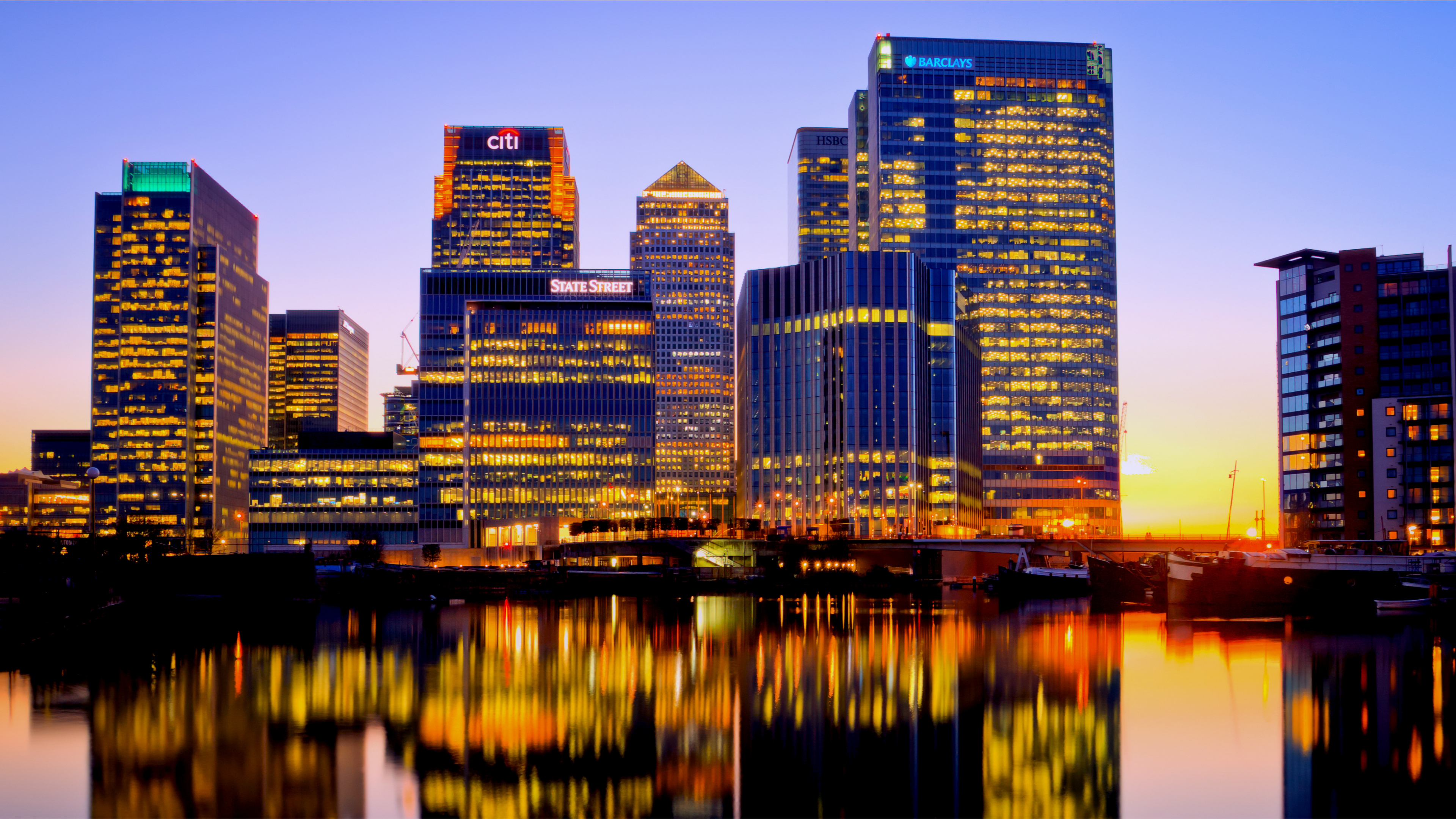 City Skyline Across Body of Water During Night Time. Wallpaper in 3840x2160 Resolution