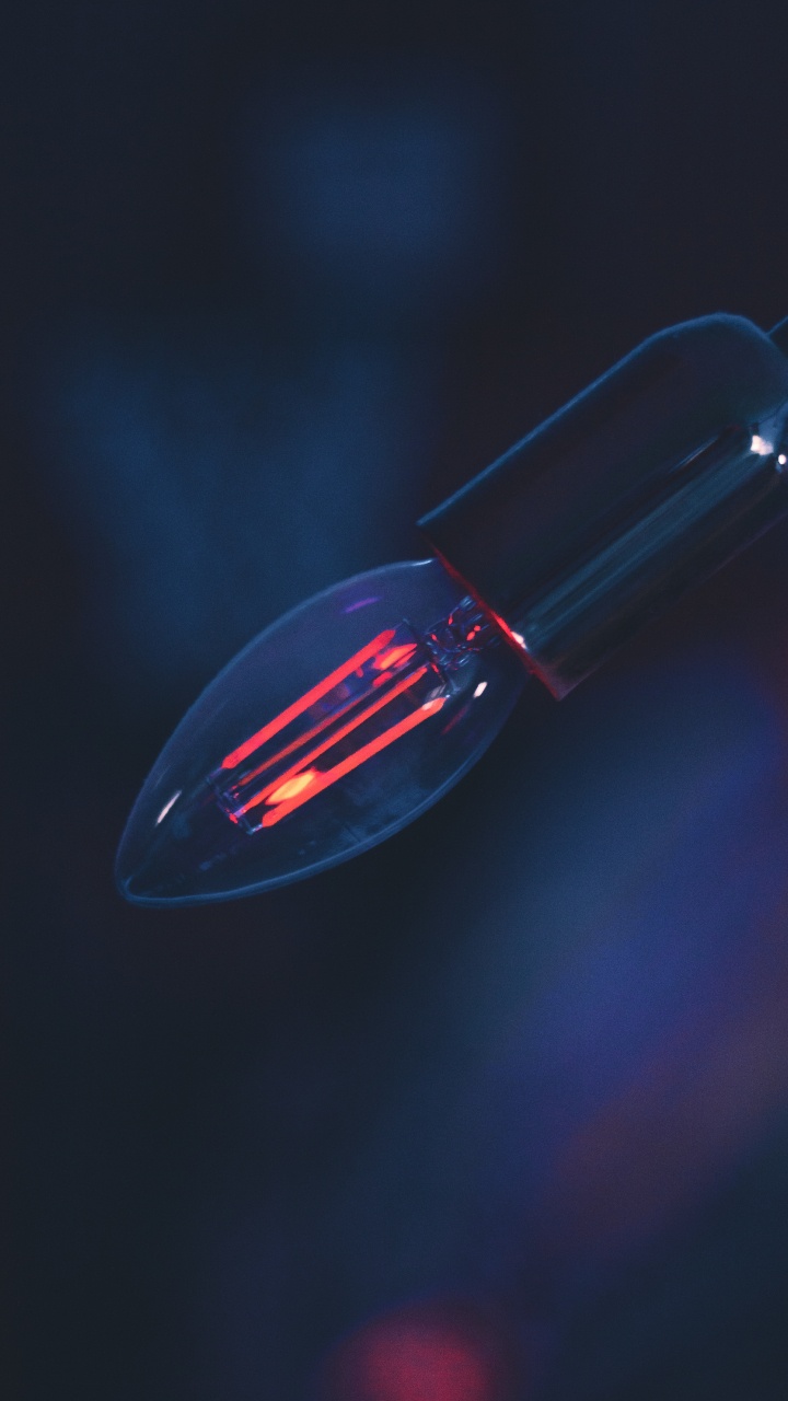 Red Light Bulb in Dark Room. Wallpaper in 720x1280 Resolution