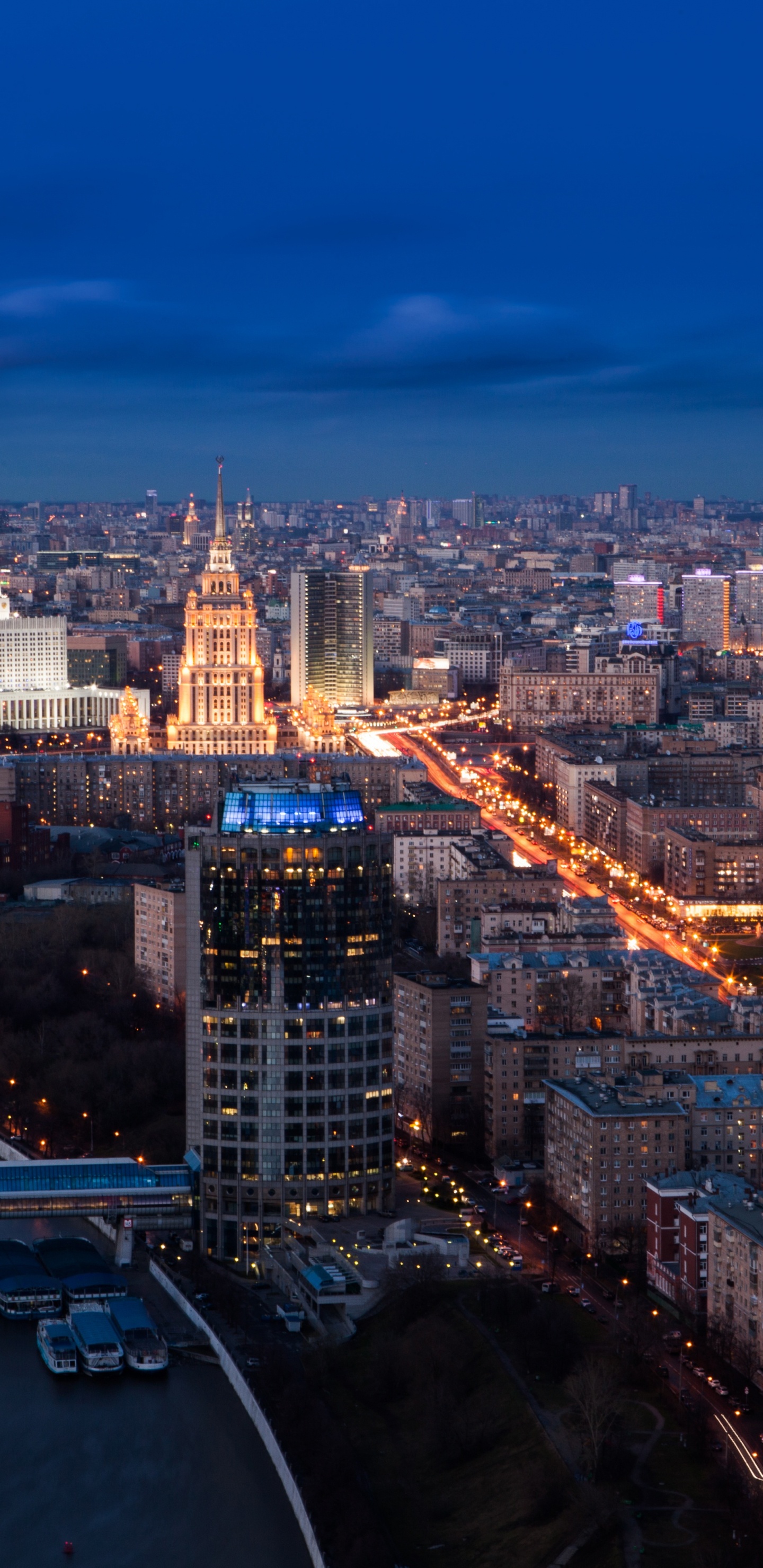 Aerial View of City Buildings During Night Time. Wallpaper in 1440x2960 Resolution