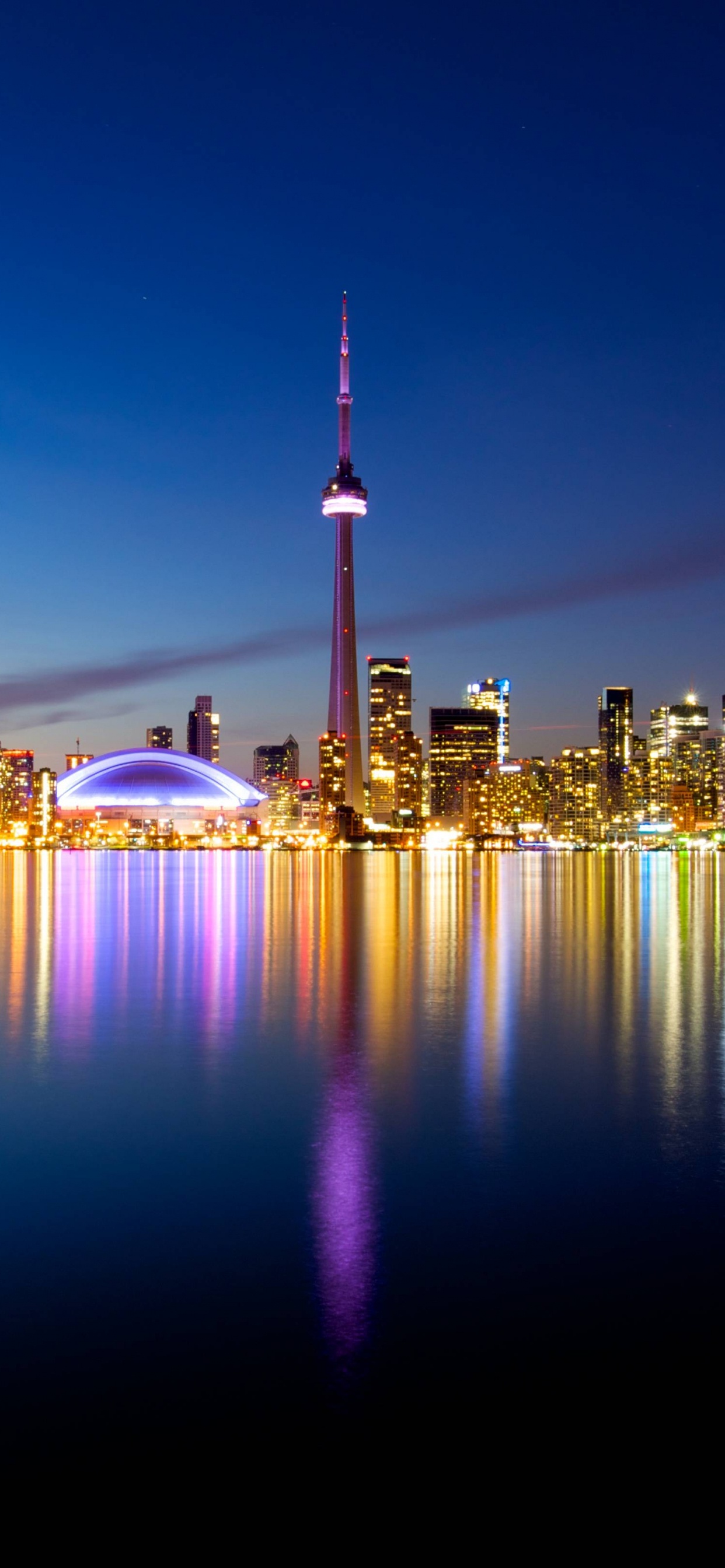 Horizonte de la Ciudad Durante la Noche. Wallpaper in 1242x2688 Resolution