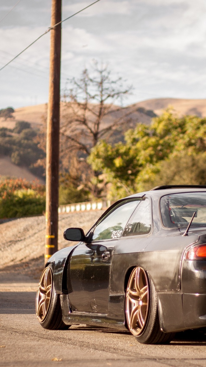 Black Porsche 911 on Road During Daytime. Wallpaper in 720x1280 Resolution
