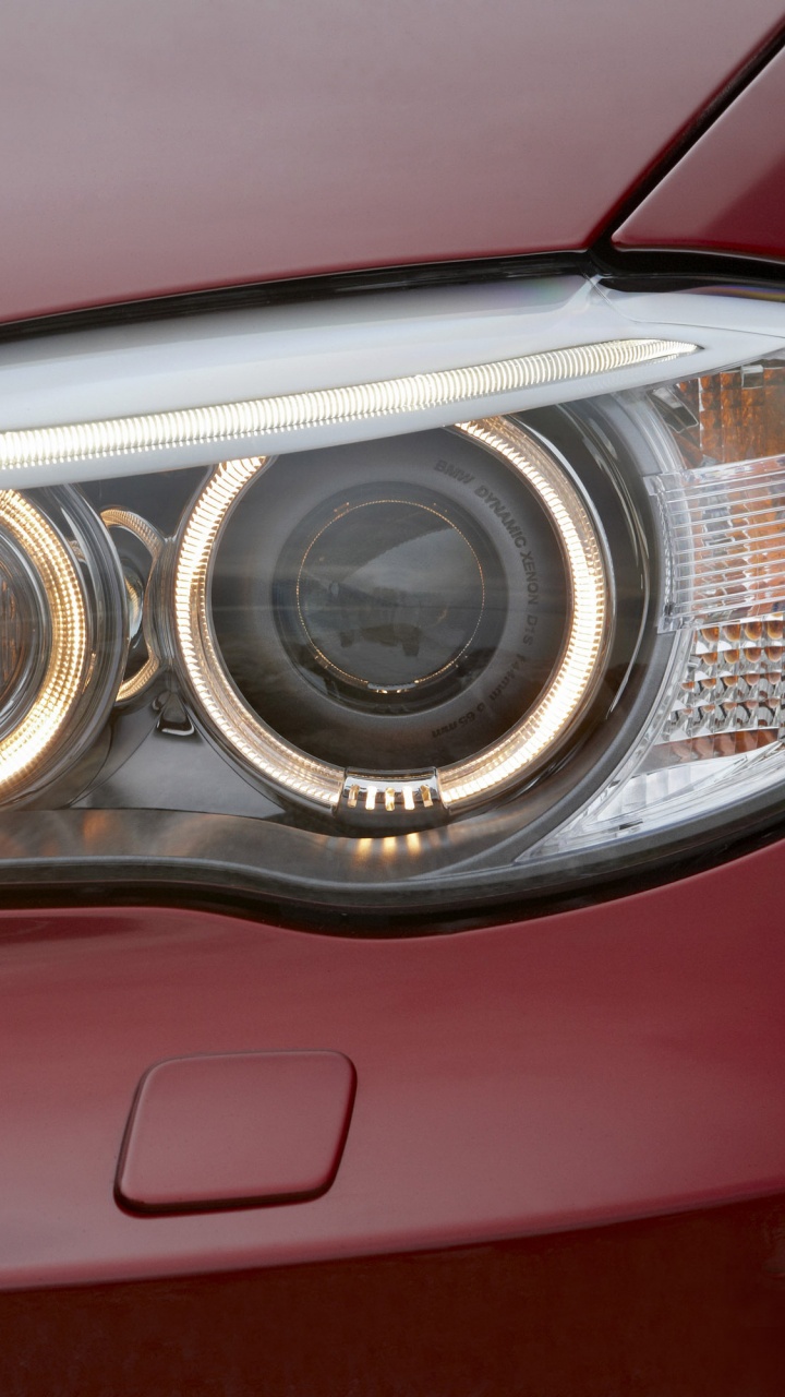Red Car With White and Black Car Window. Wallpaper in 720x1280 Resolution