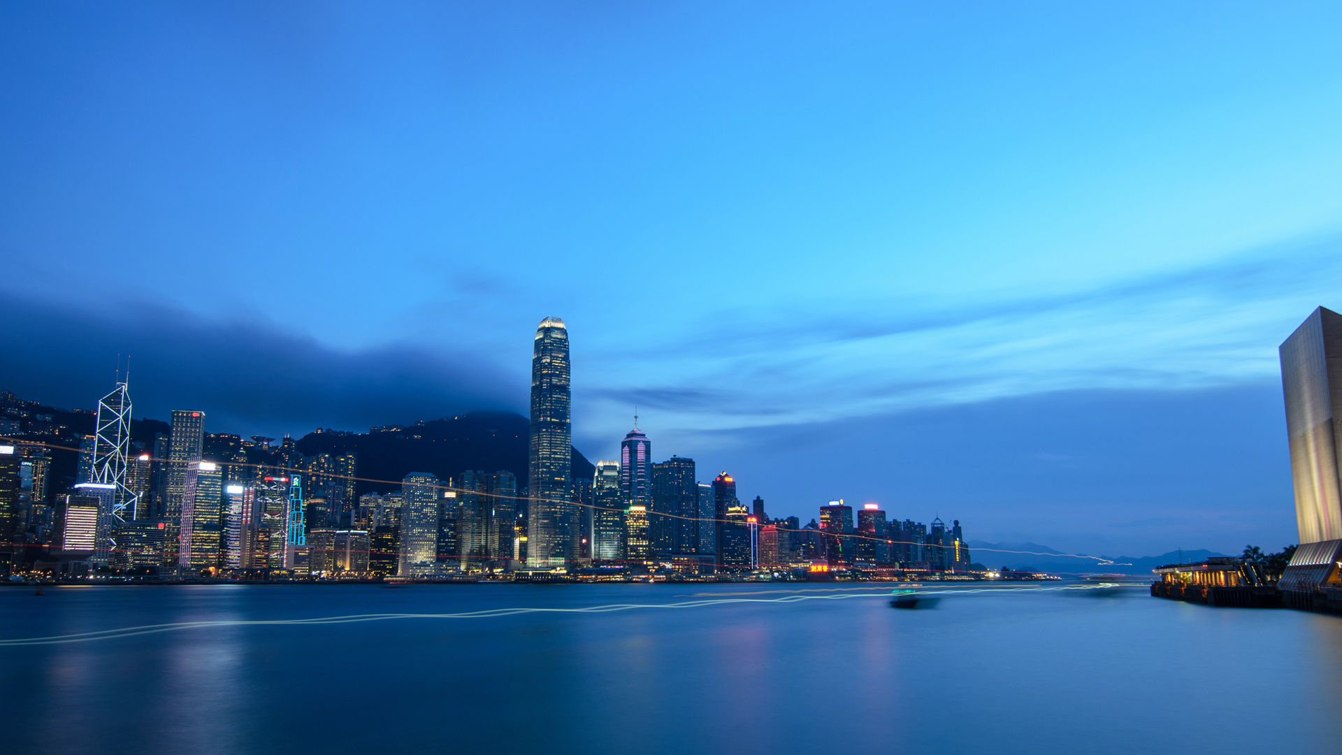 City Skyline Across Body of Water During Night Time. Wallpaper in 1920x1080 Resolution