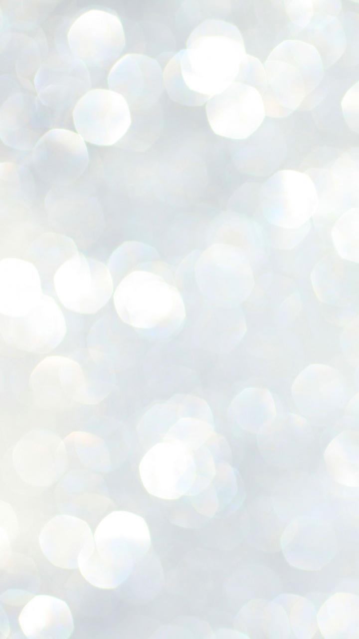 Weiße Und Blaue Bokeh-Lichter. Wallpaper in 720x1280 Resolution