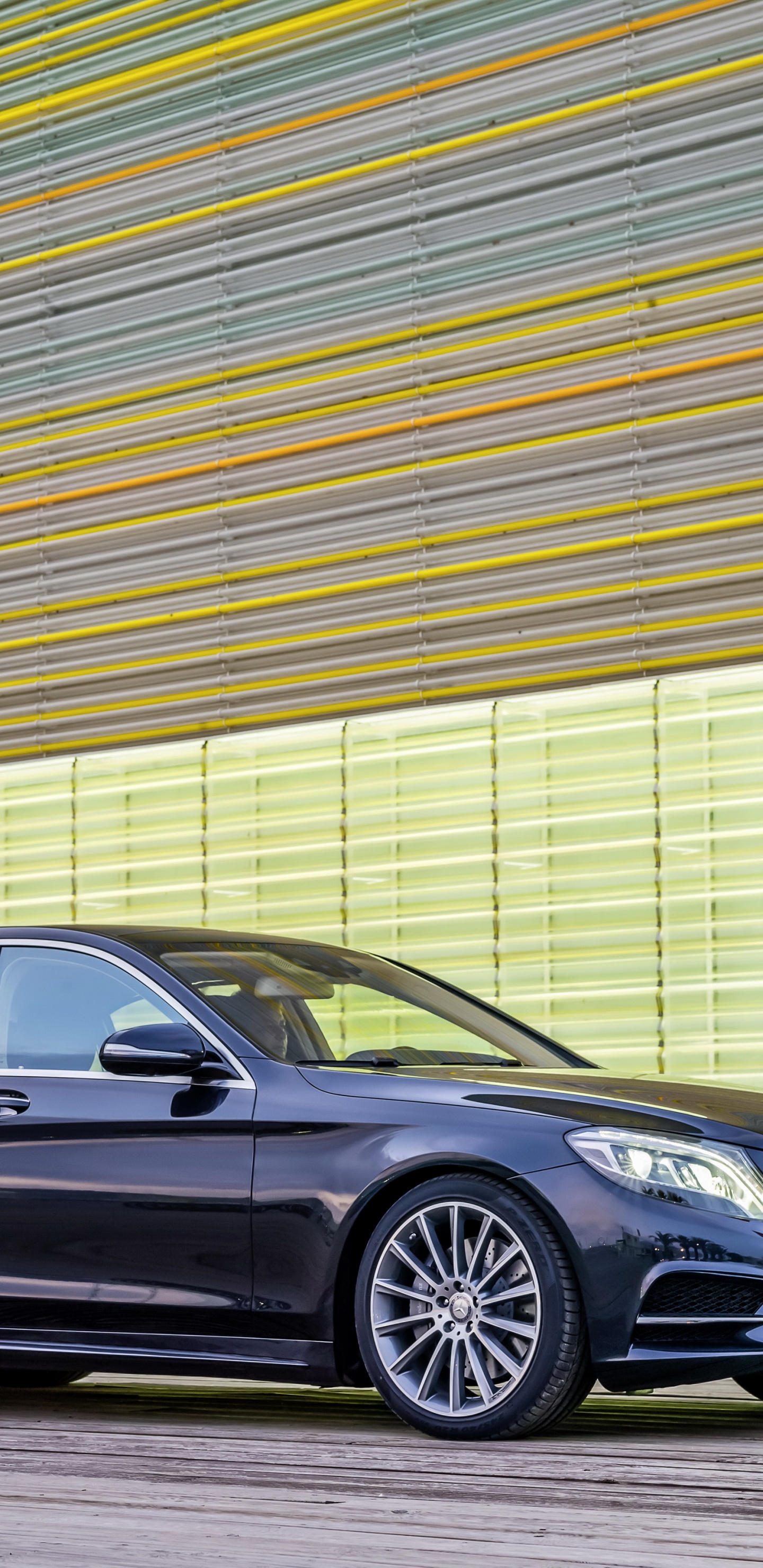 Black Mercedes Benz Coupe Parked Beside Brown Wall. Wallpaper in 1440x2960 Resolution