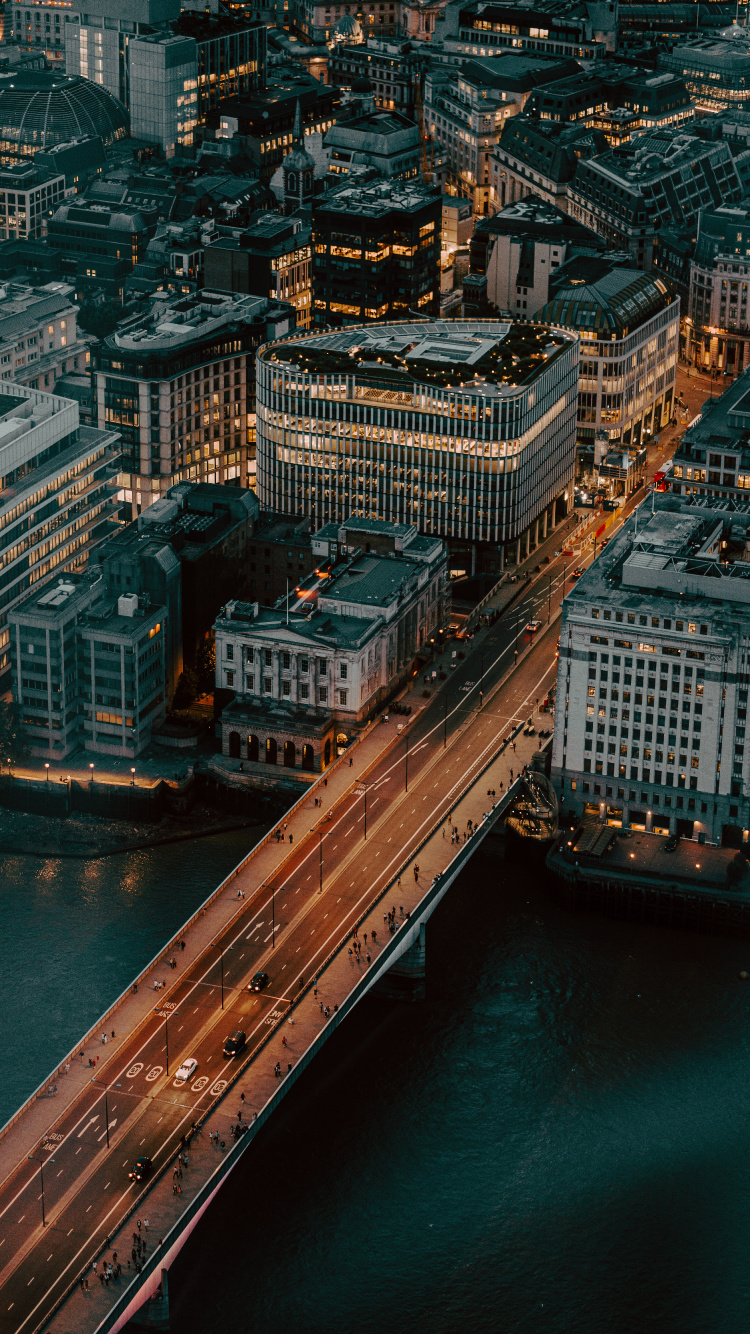 Vue Aérienne Des Bâtiments de la Ville Pendant la Journée. Wallpaper in 750x1334 Resolution