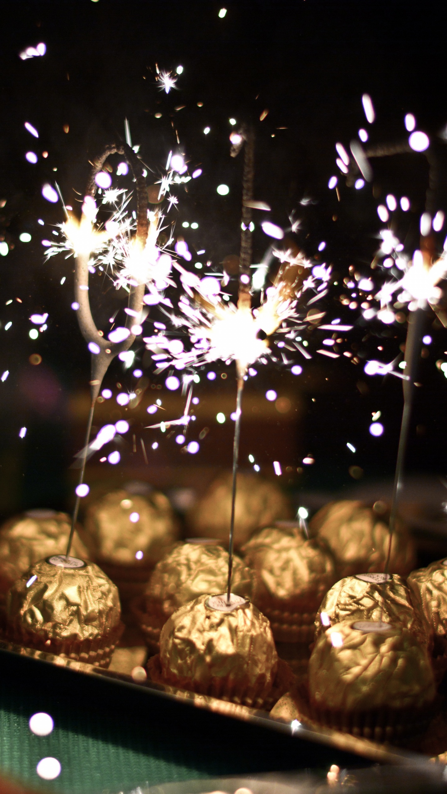 Chocolate Balls, Candy, Chocolate, Fireworks, Sparkler. Wallpaper in 1440x2560 Resolution