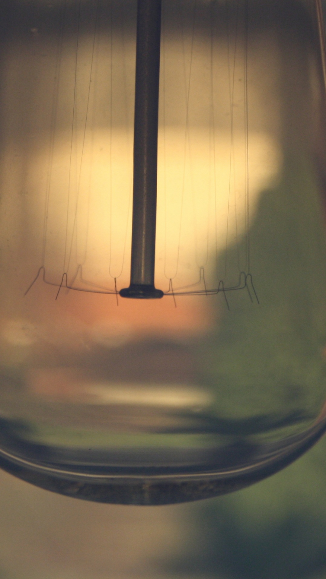 Clear Glass Light Bulb Turned on in Close up Photography. Wallpaper in 1080x1920 Resolution