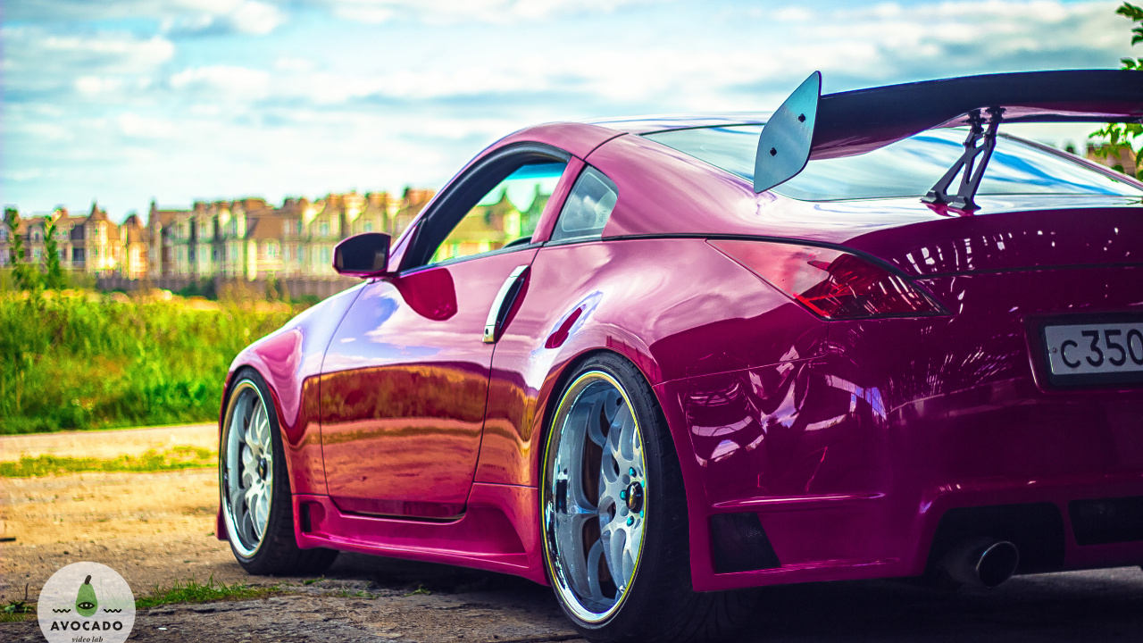 Red Porsche 911 on Green Grass Field During Daytime. Wallpaper in 1280x720 Resolution