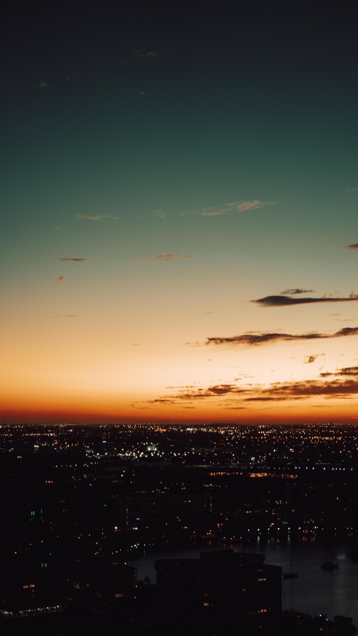 Silhouette of City Buildings During Sunset. Wallpaper in 720x1280 Resolution