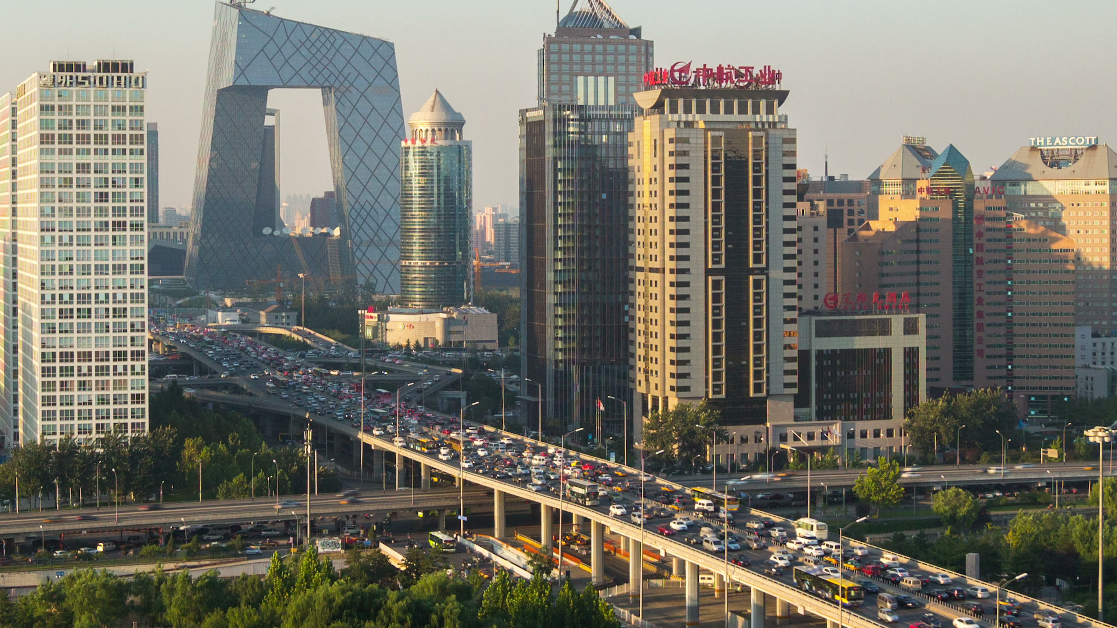 Cars on Road Near High Rise Buildings During Daytime. Wallpaper in 3840x2160 Resolution