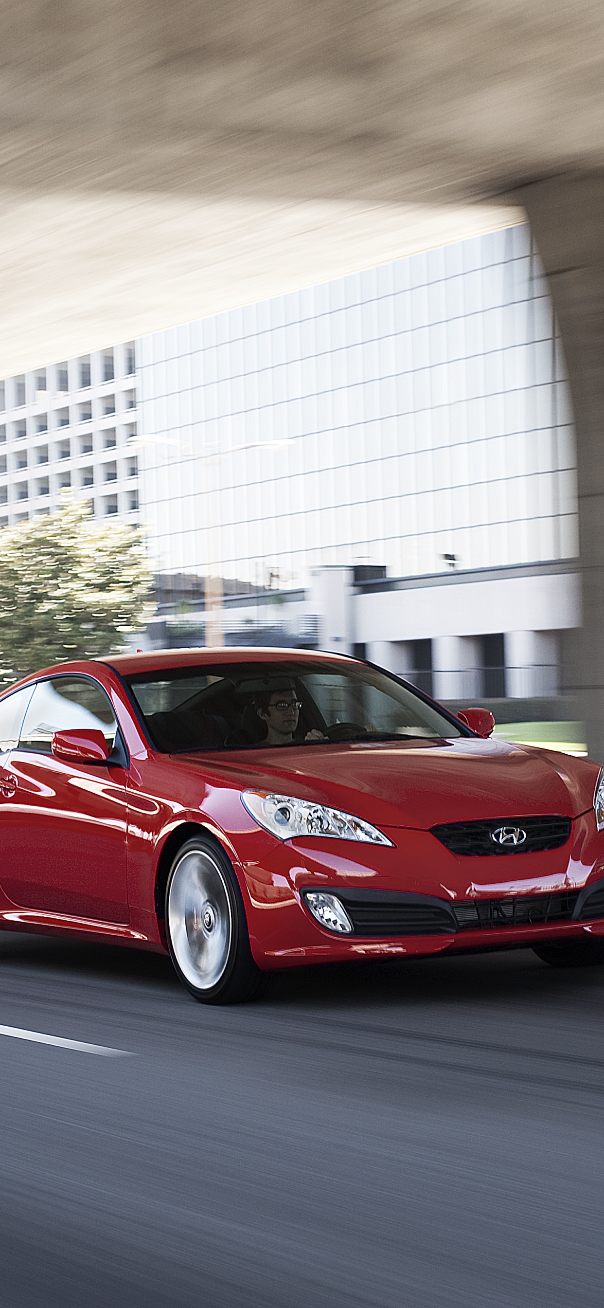 Red Porsche 911 on Road During Daytime. Wallpaper in 1242x2688 Resolution