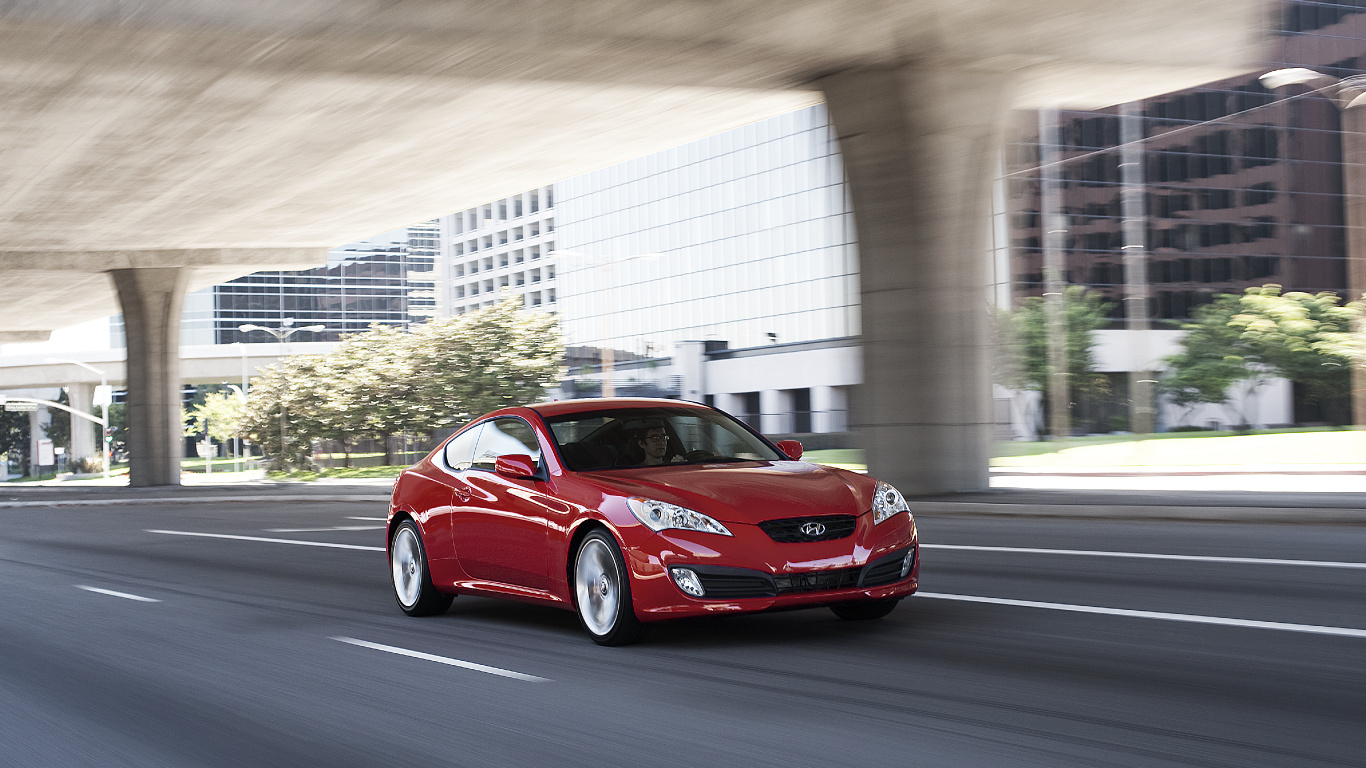 Roter Porsche 911 Tagsüber Unterwegs. Wallpaper in 1366x768 Resolution