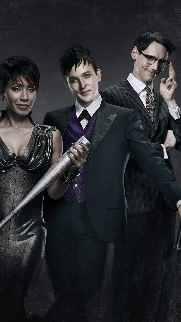 Homme en Veste de Costume Noir Tenant un Bâton Noir. Wallpaper in 750x1334 Resolution