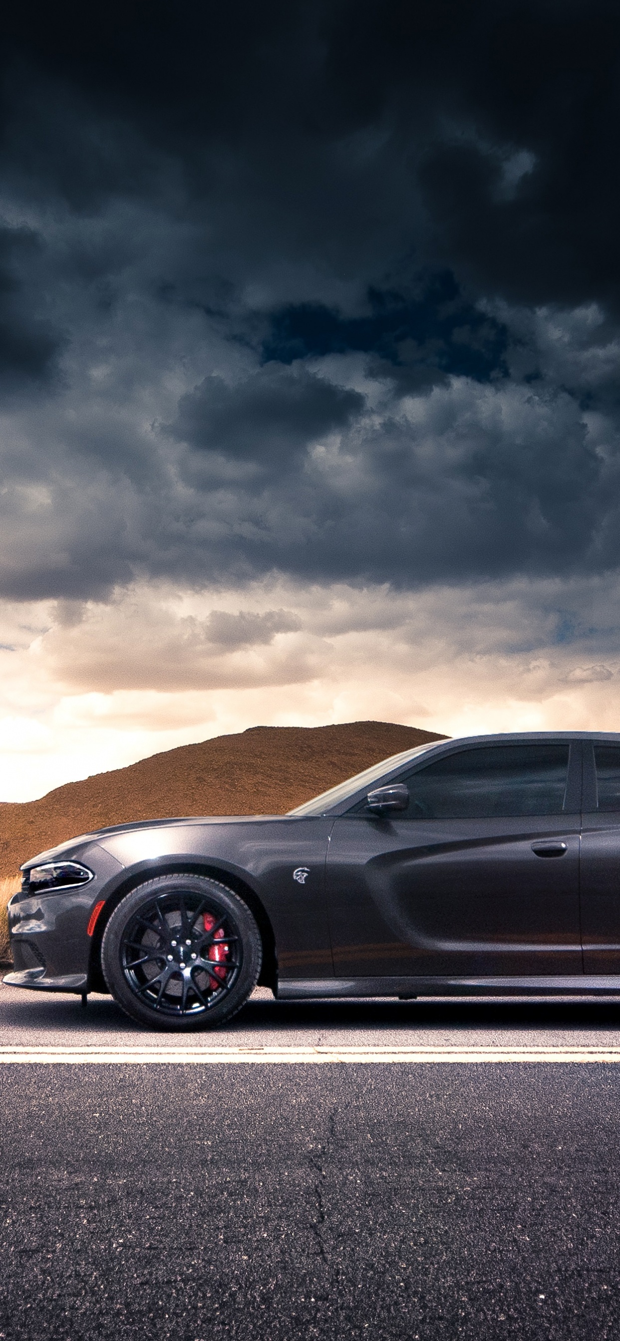 Black Porsche 911 on Road During Daytime. Wallpaper in 1242x2688 Resolution