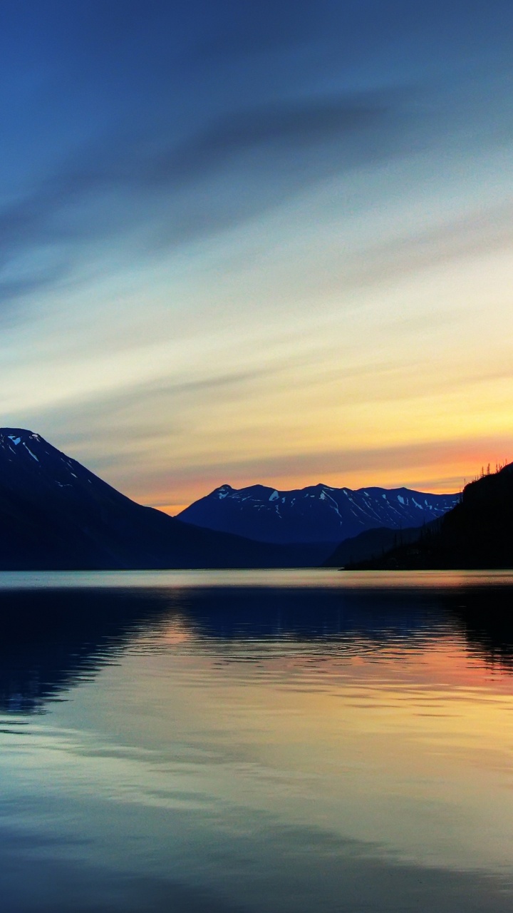 Body of Water Near Mountain During Daytime. Wallpaper in 720x1280 Resolution