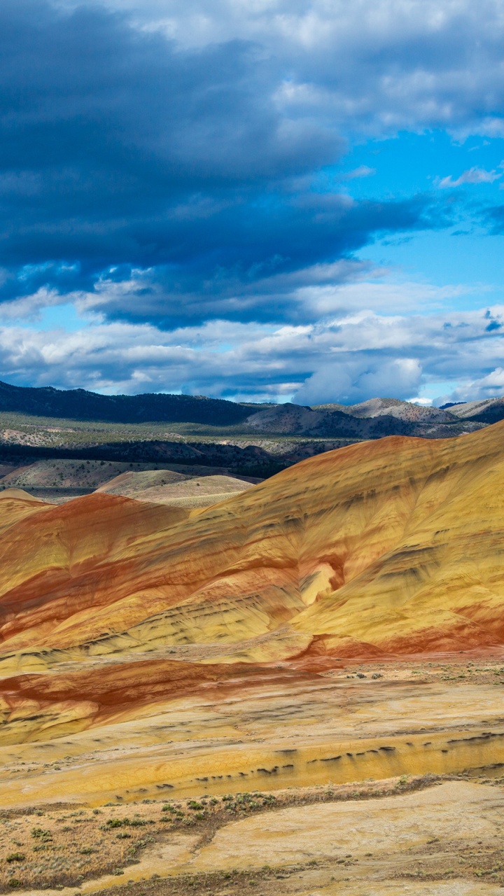 Brown and Gray Mountains Under Blue Sky During Daytime. Wallpaper in 720x1280 Resolution