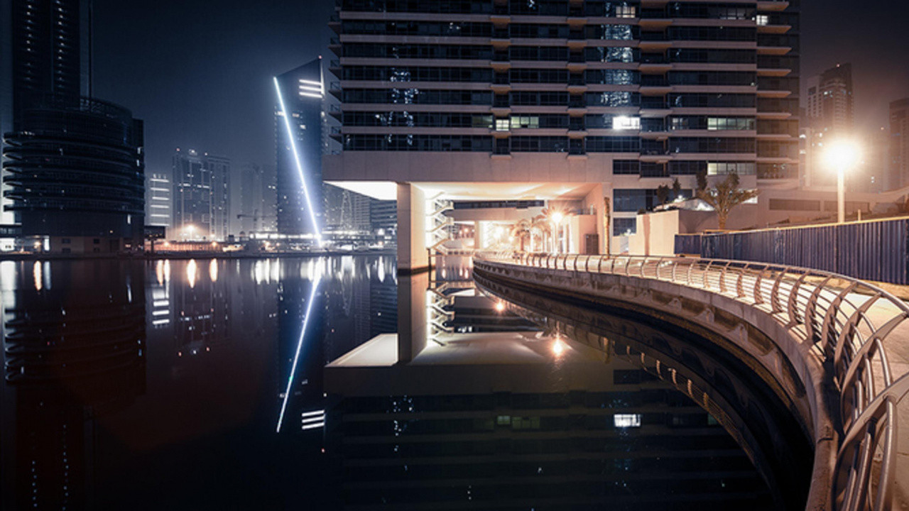 White Concrete Bridge Over River During Nighttime. Wallpaper in 1280x720 Resolution