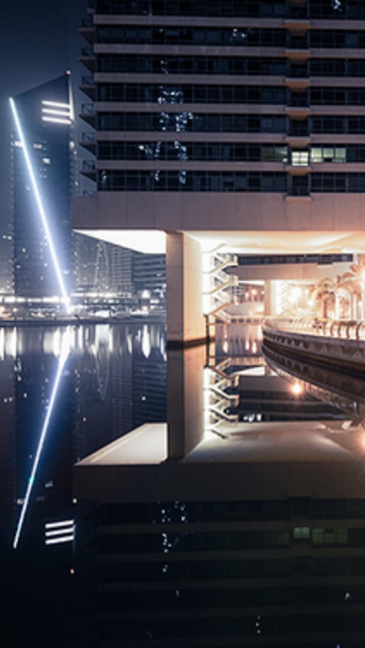 Puente de Hormigón Blanco Sobre el Río Durante la Noche. Wallpaper in 720x1280 Resolution