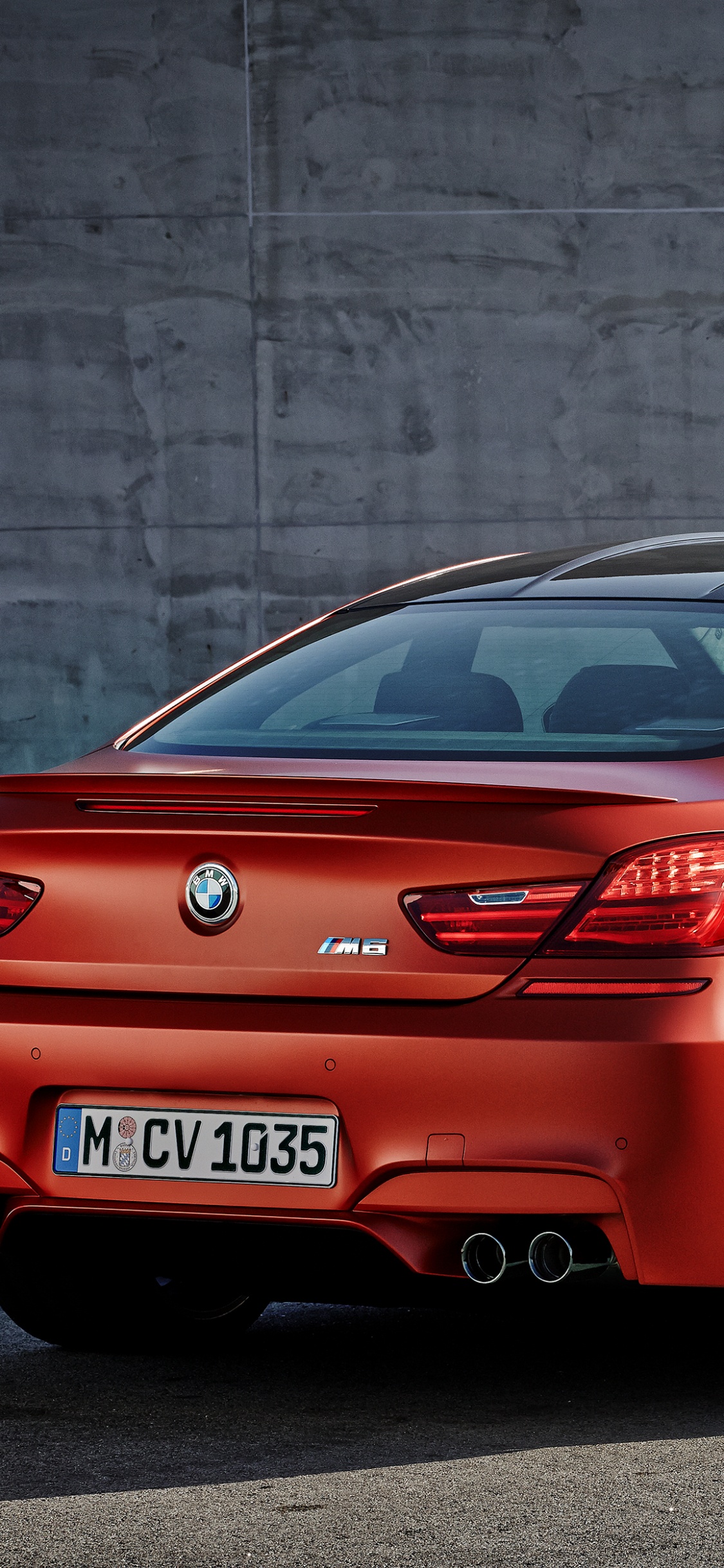 Red Bmw m 3 Coupe. Wallpaper in 1125x2436 Resolution