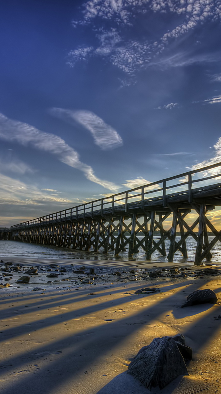 Brown Wooden Bridge Under Blue Sky During Daytime. Wallpaper in 750x1334 Resolution