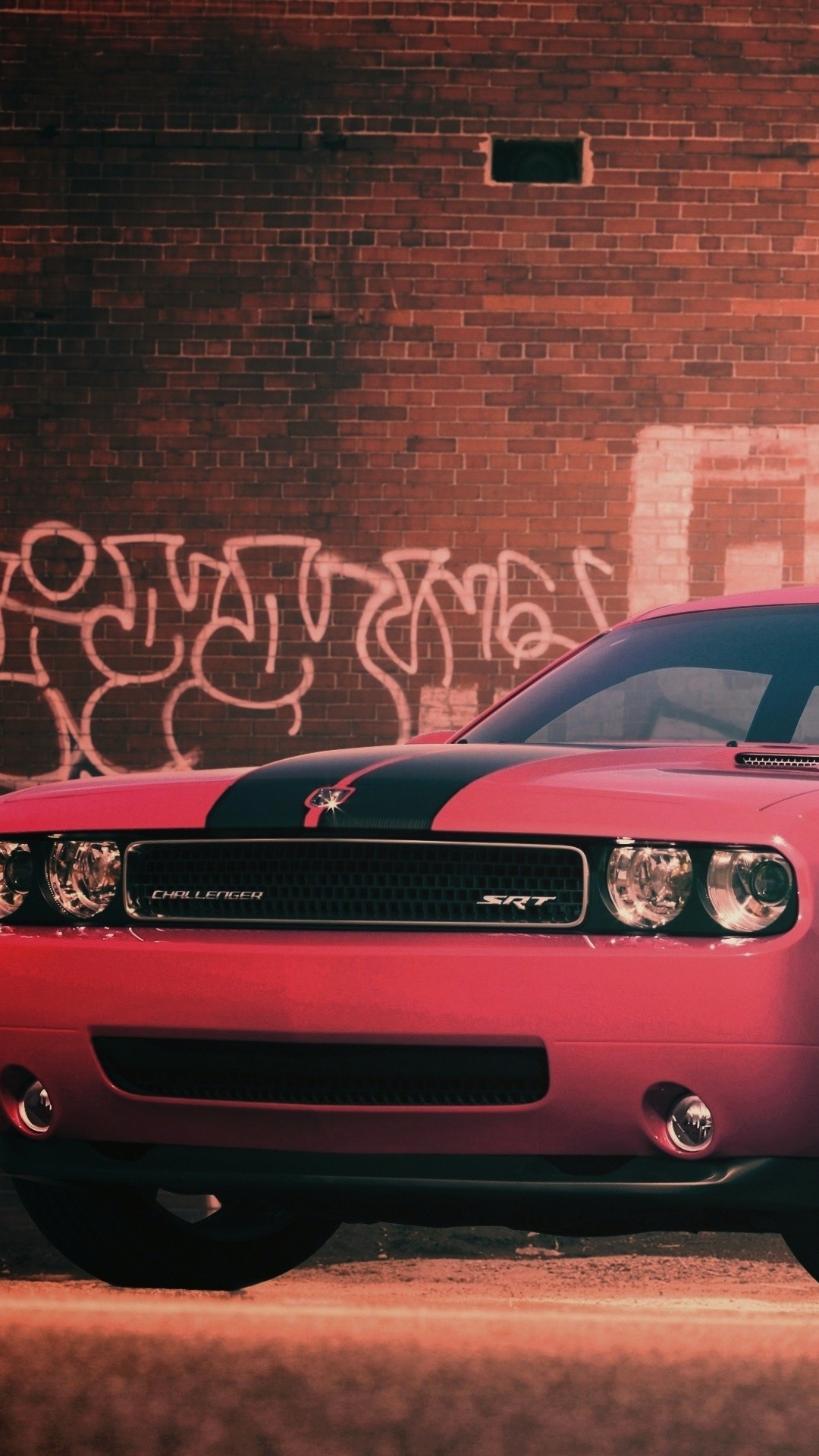 Rotes Mercedes Benz Coupé Neben Brauner Backsteinmauer Geparkt. Wallpaper in 1080x1920 Resolution