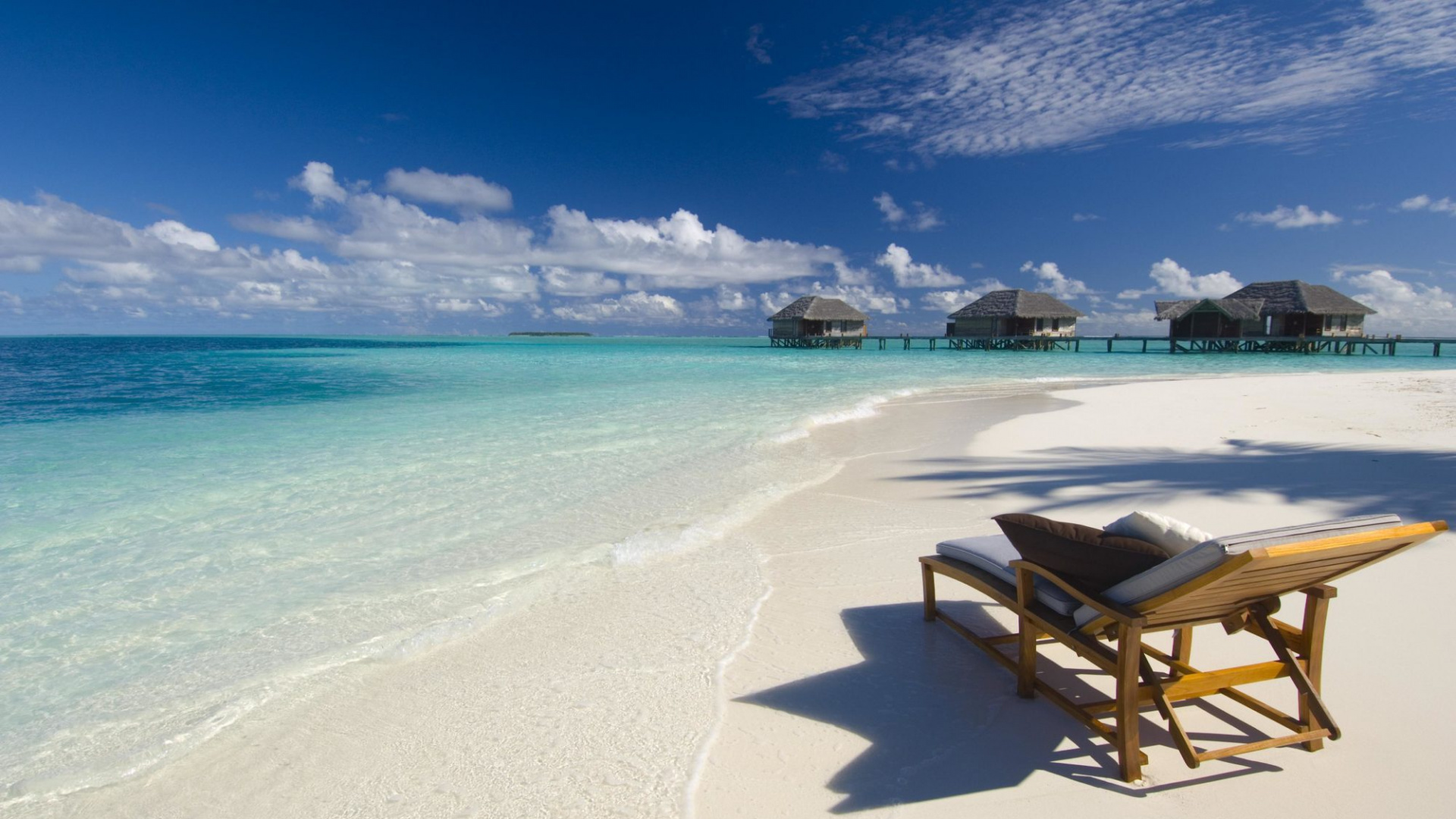 Brown Wooden Chair on Beach During Daytime. Wallpaper in 1920x1080 Resolution