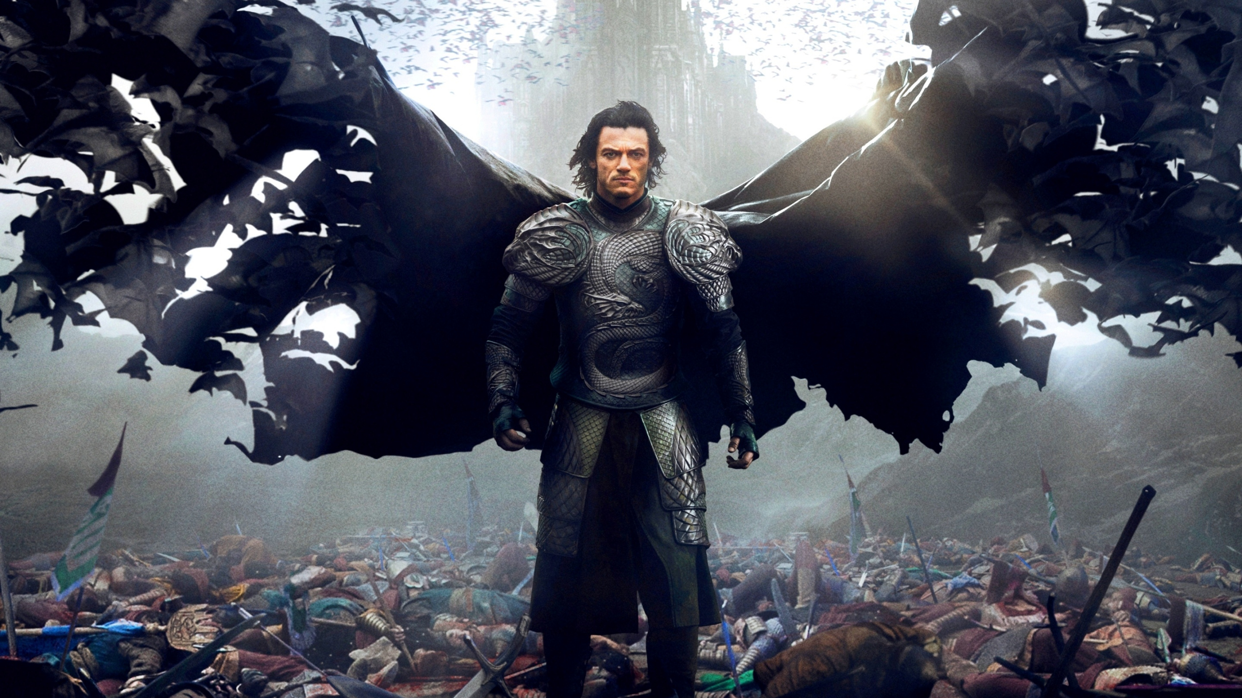 Mann im Schwarzen Und Grauen Anzug, Der Neben Einem Schwarzen Und Braunen Tier Steht. Wallpaper in 2560x1440 Resolution