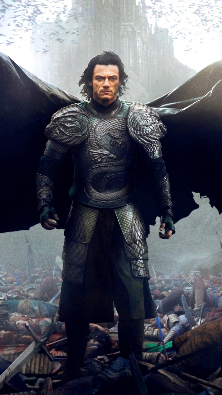 Mann im Schwarzen Und Grauen Anzug, Der Neben Einem Schwarzen Und Braunen Tier Steht. Wallpaper in 750x1334 Resolution