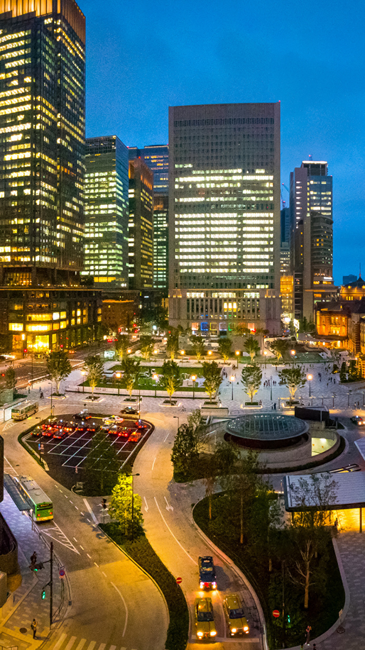 Edificios de Gran Altura Durante la Noche. Wallpaper in 750x1334 Resolution
