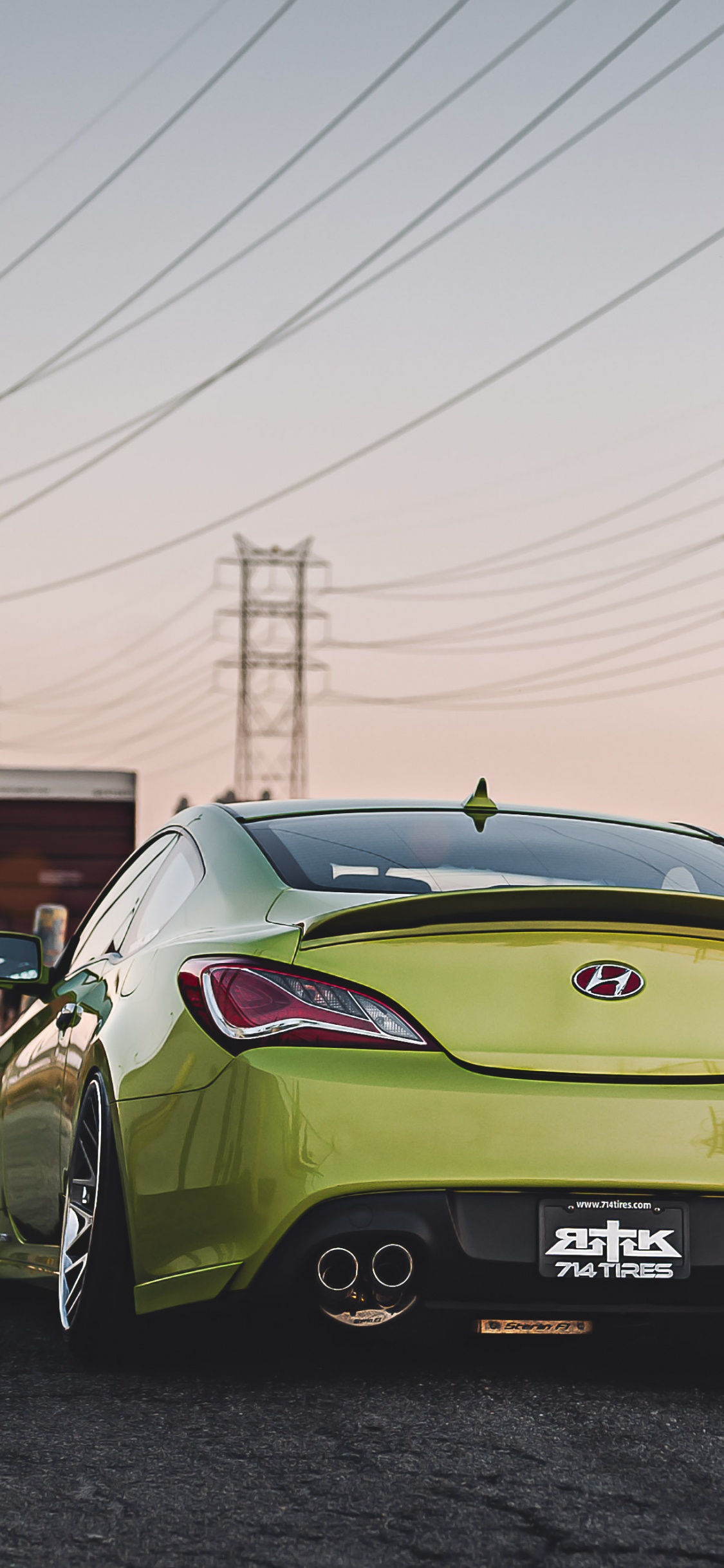 Yellow Porsche 911 Parked on Road During Daytime. Wallpaper in 1125x2436 Resolution