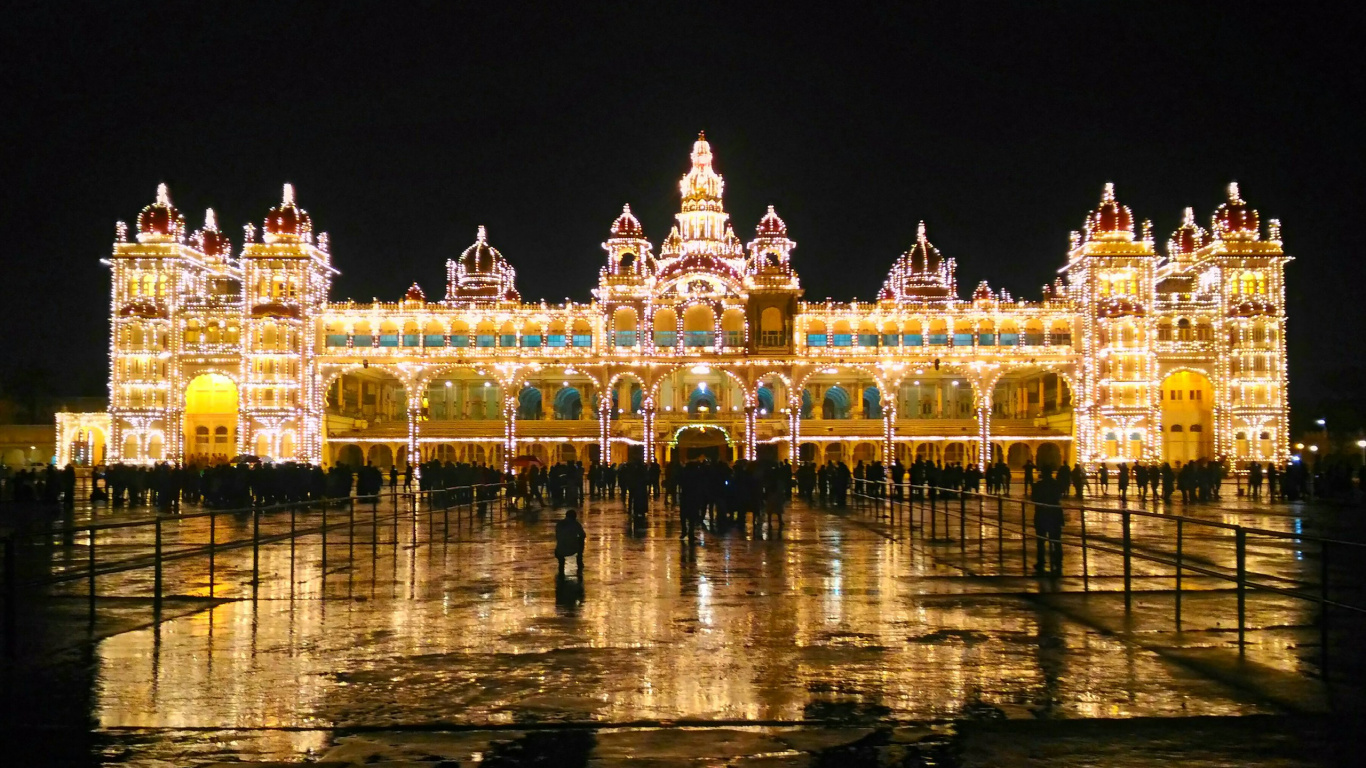 White Concrete Building During Night Time. Wallpaper in 1366x768 Resolution
