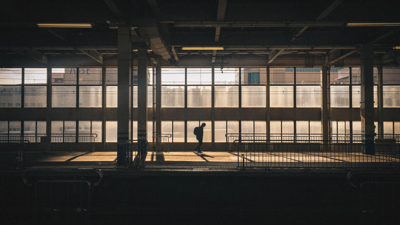 Silhouette of Person Walking on Sidewalk During Daytime. Wallpaper in 1280x720 Resolution